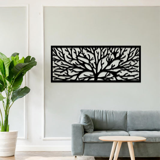 A metal wall art design featuring a detailed tree silhouette with sprawling branches, enclosed in a rectangular frame. The art is displayed on a neutral wall in a modern living room, complementing the contemporary decor and natural elements in the space.
