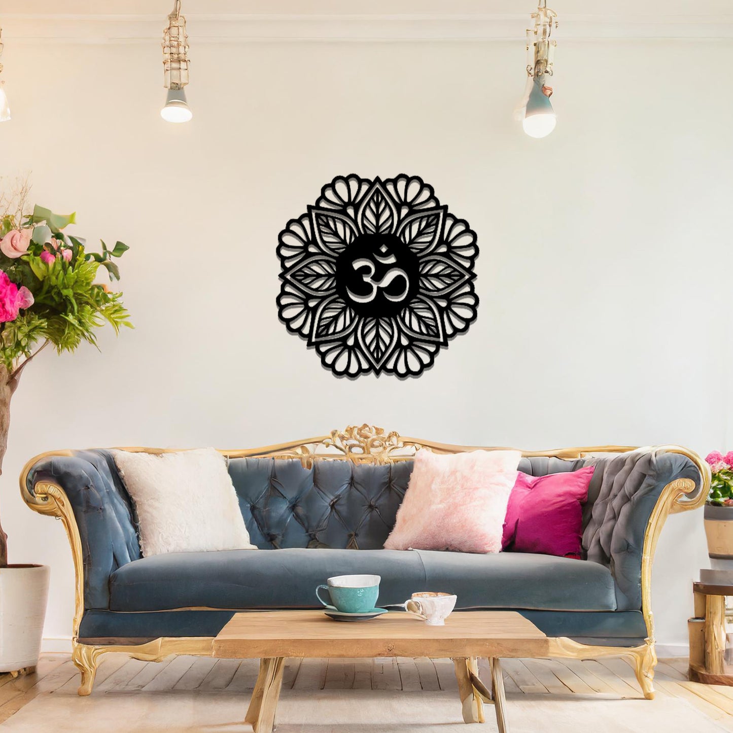 Metal wall art featuring an intricate mandala design with the Om symbol at its center, mounted on a neutral wall within modern decor. The spiritual motif and detailed craftsmanship create a calming and elegant focal point.