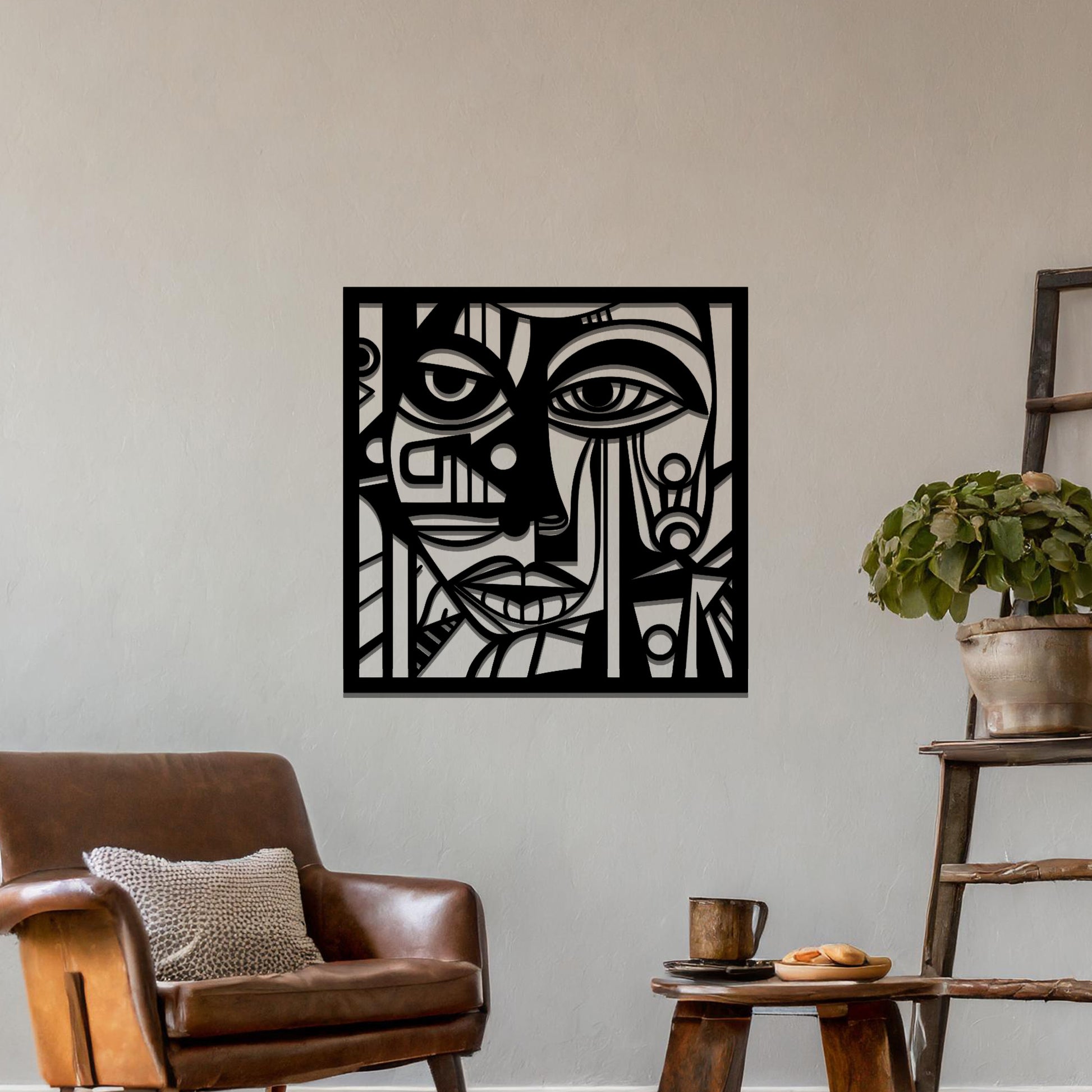 A metal wall art design featuring an abstract face with geometric shapes and sharp lines. The face's features are creatively outlined with strong contrasts, adding a modern, artistic touch to the space. The piece is displayed on a neutral wall, enhancing the room’s decor.