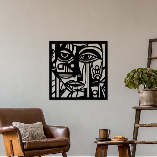 A metal wall art design featuring an abstract face with geometric shapes and sharp lines. The face's features are creatively outlined with strong contrasts, adding a modern, artistic touch to the space. The piece is displayed on a neutral wall, enhancing the room’s decor.
