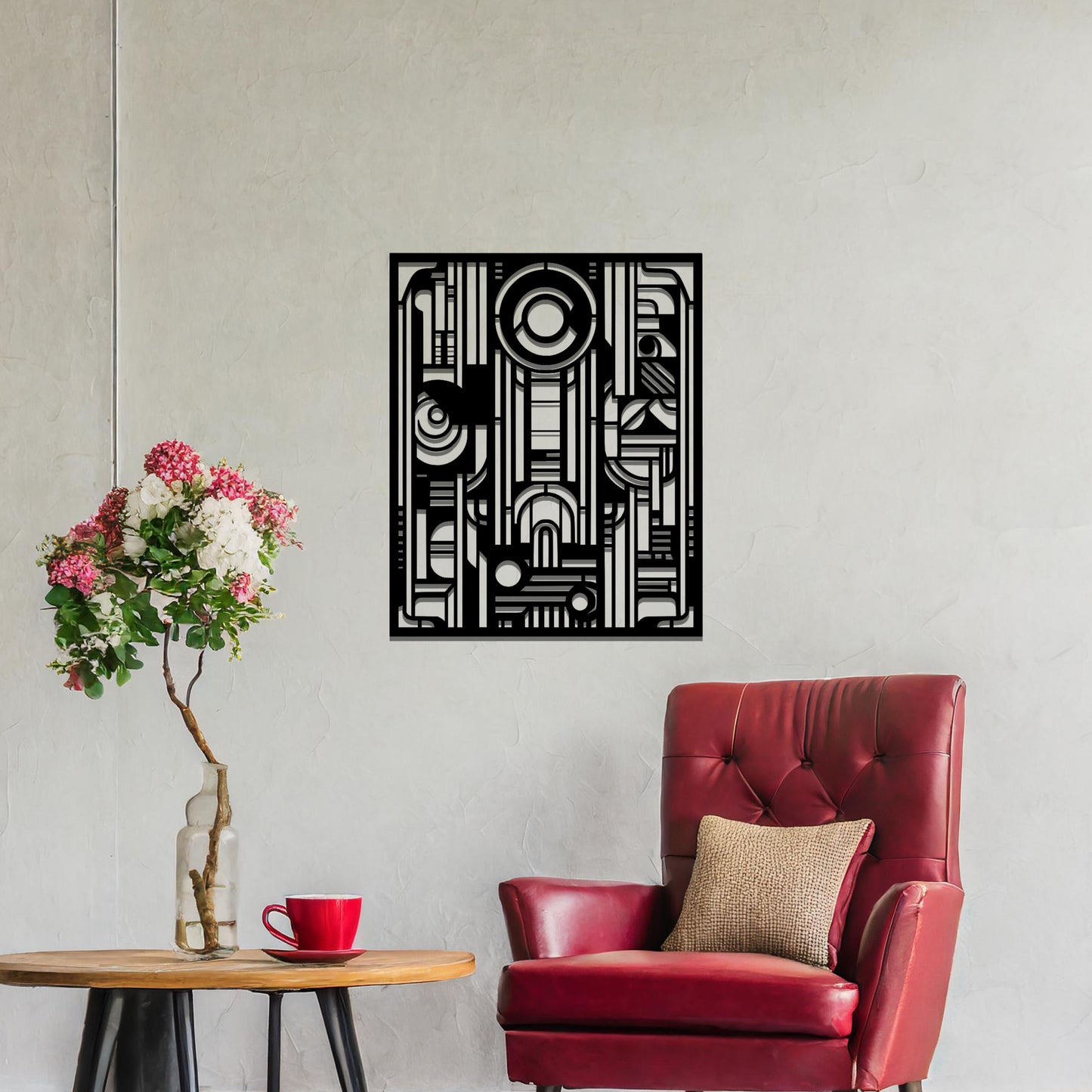A geometric metal wall art featuring an intricate pattern with a combination of circles, lines, and arches. The design is framed within a rectangular shape, displayed on a neutral wall. The piece adds a modern touch to the room's decor.