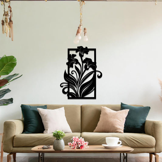 A metal wall art design featuring a graceful floral arrangement with flowers and curving leaves within a rectangular frame. The art is displayed on a neutral wall in a modern living room, enhancing the space with a touch of elegance and nature.