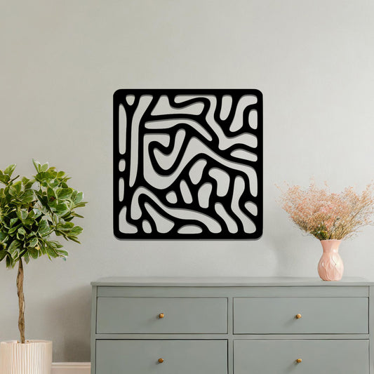 Abstract flowing line design with curved and irregular patterns, creating a dynamic and modern composition. The art is displayed on a neutral wall in a minimalist room with contemporary decor.