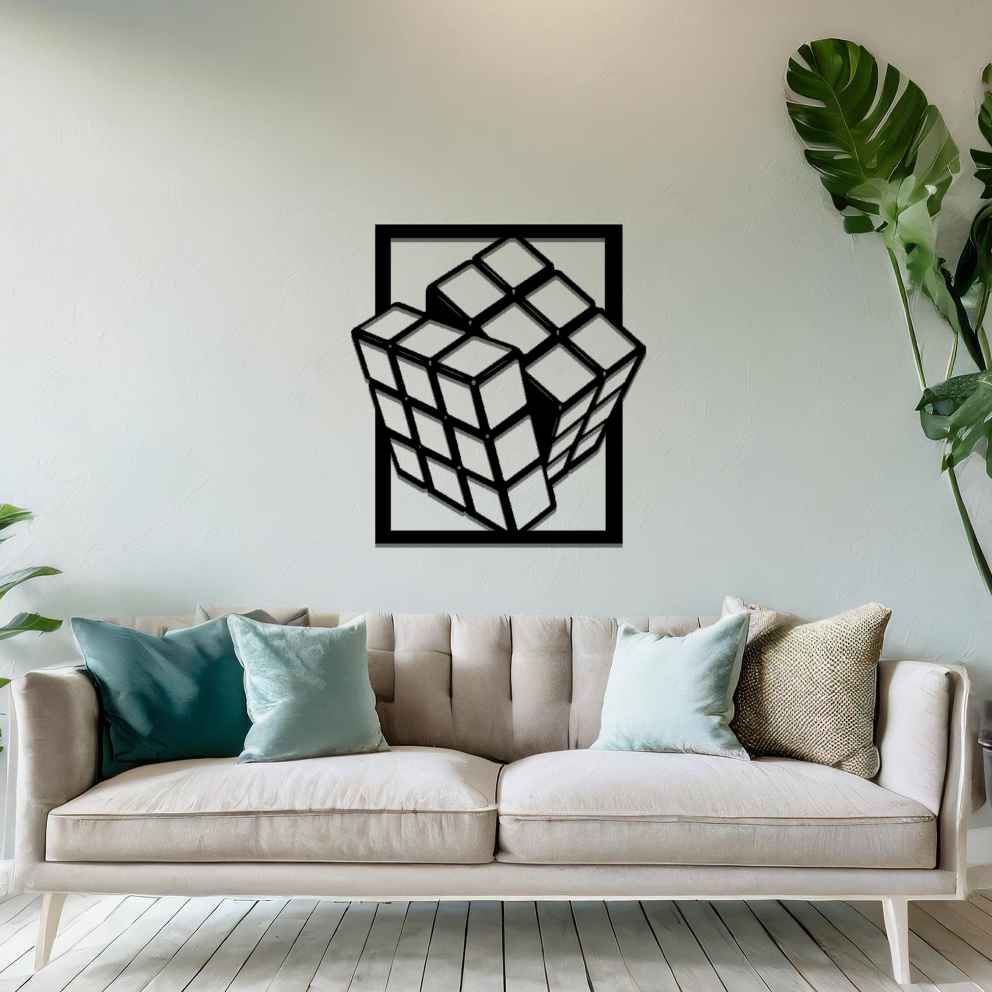 Metal wall art featuring a rectangular design of a three-dimensional cube, showcasing bold geometric shapes and a modern aesthetic as a statement piece.