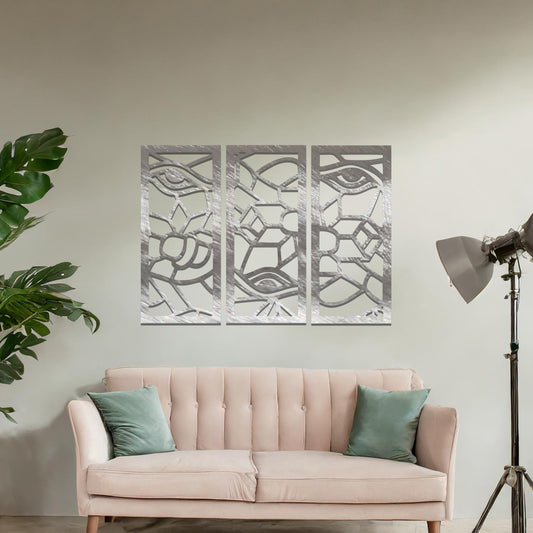 Decorative metal wall art featuring a set of three geometric panels with intricate abstract designs, mounted on a neutral wall within modern room decor. The focus is on the unique craftsmanship and harmonious composition of the wall art, enhancing the contemporary aesthetic of the space.
