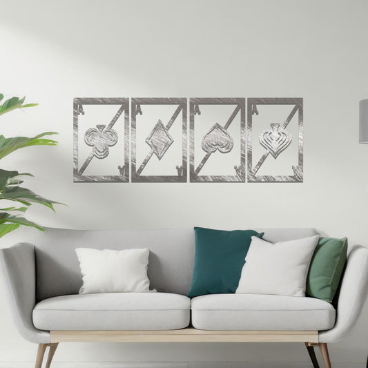 Metal wall art featuring a four-panel design inspired by playing card suits—clubs, diamonds, hearts, and spades—each framed with a modern aesthetic, creating a bold statement piece in the interior setting.
