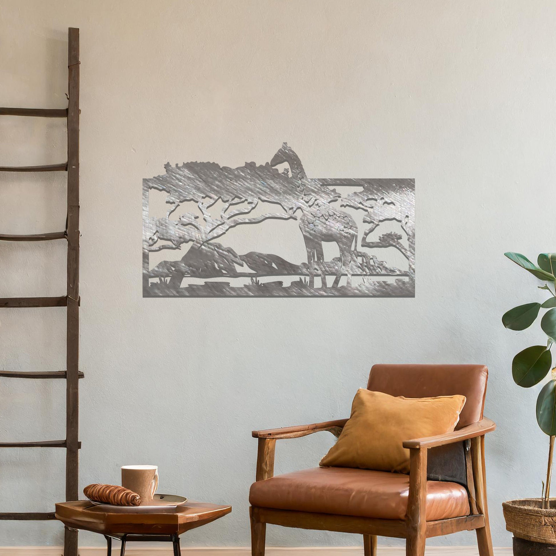 A stunning wall art piece showcasing a giraffe standing gracefully beneath a tree, set against a backdrop of mountains and an expansive savanna landscape. Perfect for bringing an essence of wildlife into your space.