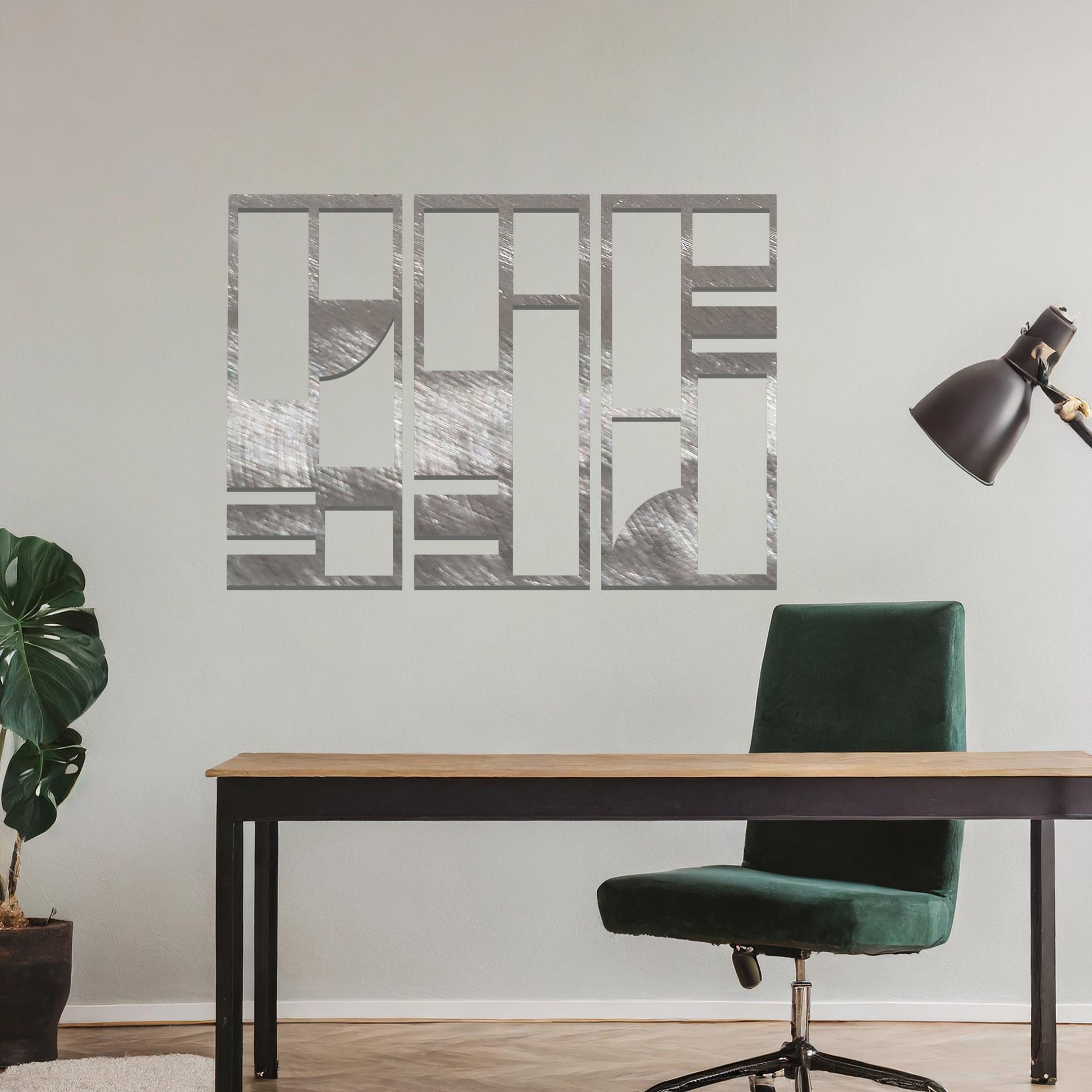 Abstract metal wall art set of three panels with geometric designs featuring rectangular and square shapes, curved lines, and clean angles. The art is displayed on a neutral wall within modern room decor, adding a contemporary touch to the space.