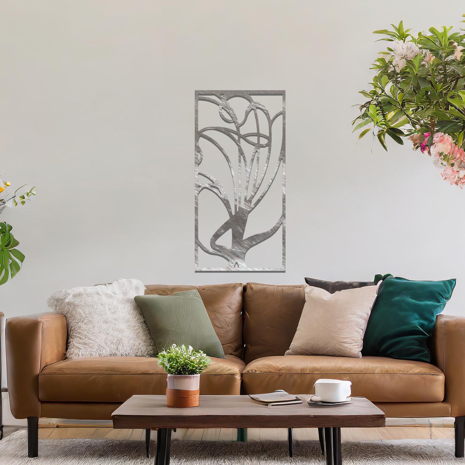 Metal wall art featuring a rectangular abstract design with flowing, interconnected lines, adding a modern and artistic element to the space.