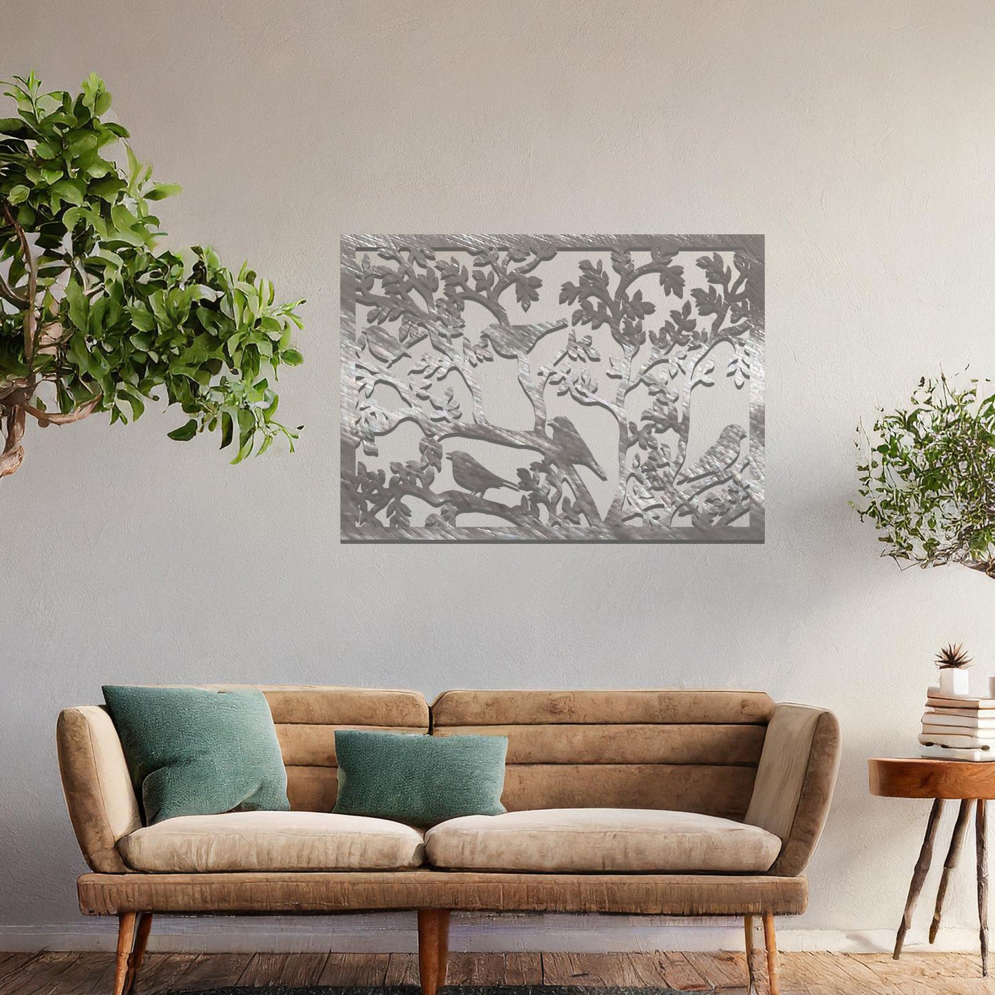 An intricately designed wall art piece showcasing birds perched on branches surrounded by delicate leaves, bringing a serene and natural touch to your interior space.