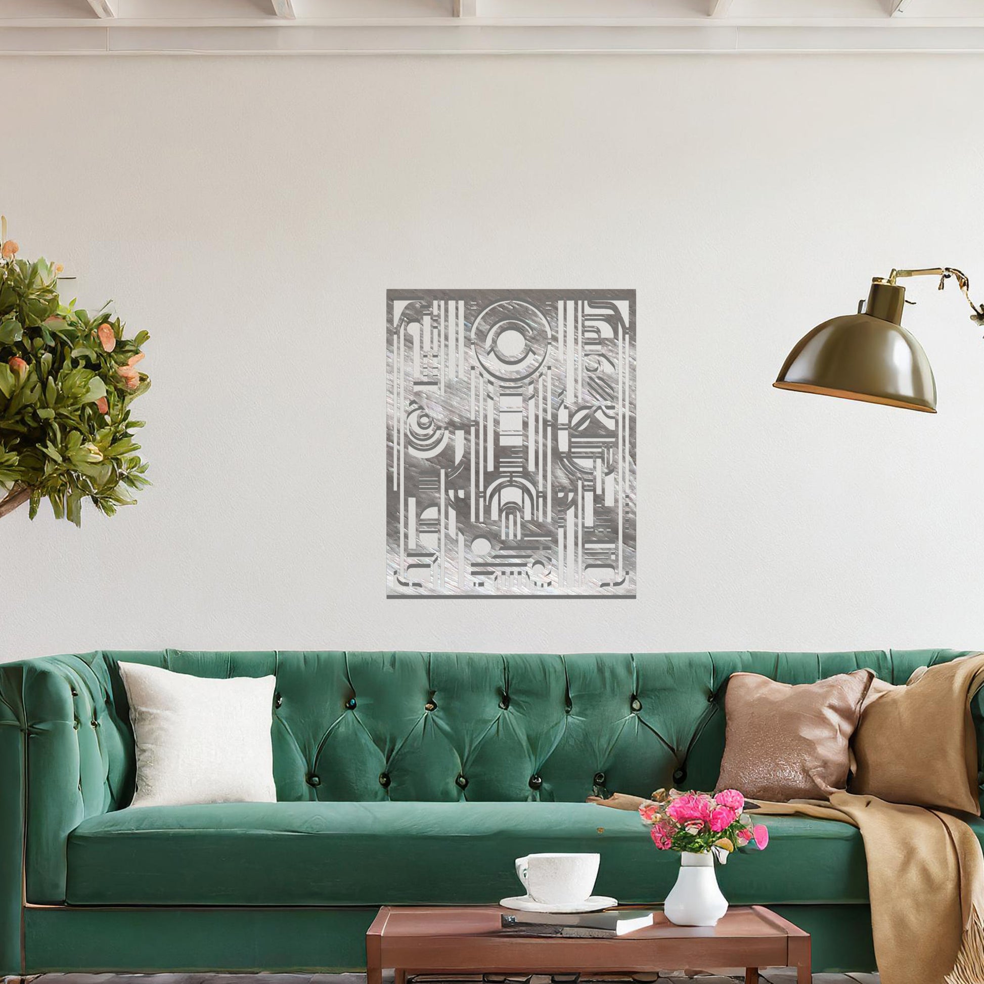 A geometric metal wall art featuring an intricate pattern with a combination of circles, lines, and arches. The design is framed within a rectangular shape, displayed on a neutral wall. The piece adds a modern touch to the room's decor.