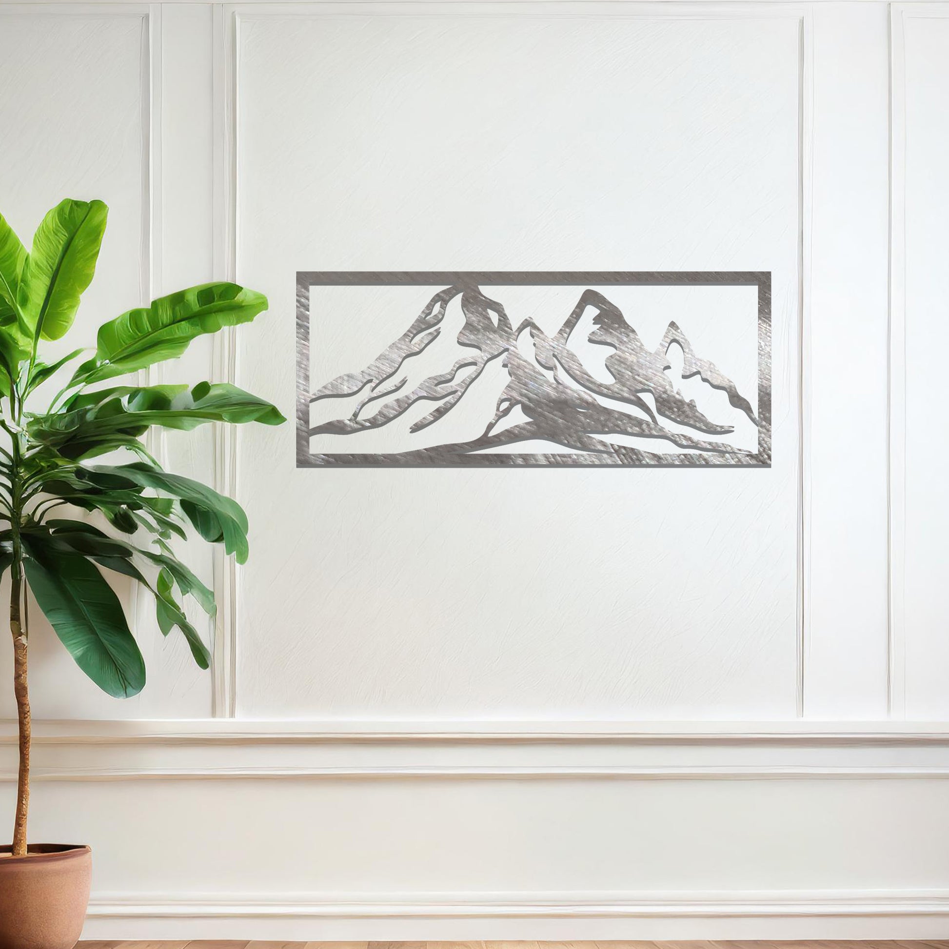A captivating wall art design featuring a majestic mountain range, crafted with clean lines and artistic contours to evoke a sense of adventure and natural beauty. Perfect for enhancing your interior aesthetic.