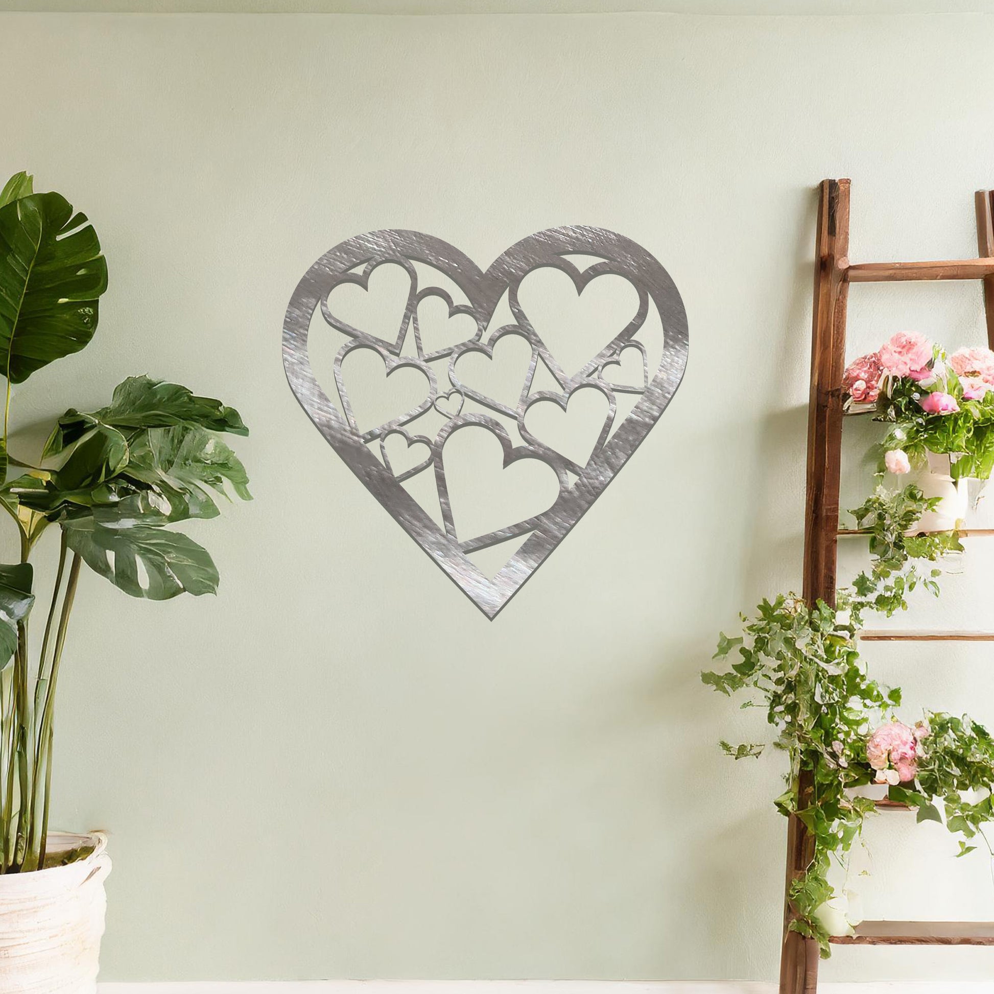 Modern heart-shaped wall art featuring a pattern of interconnected hearts, creating a stylish and romantic accent for your living space.