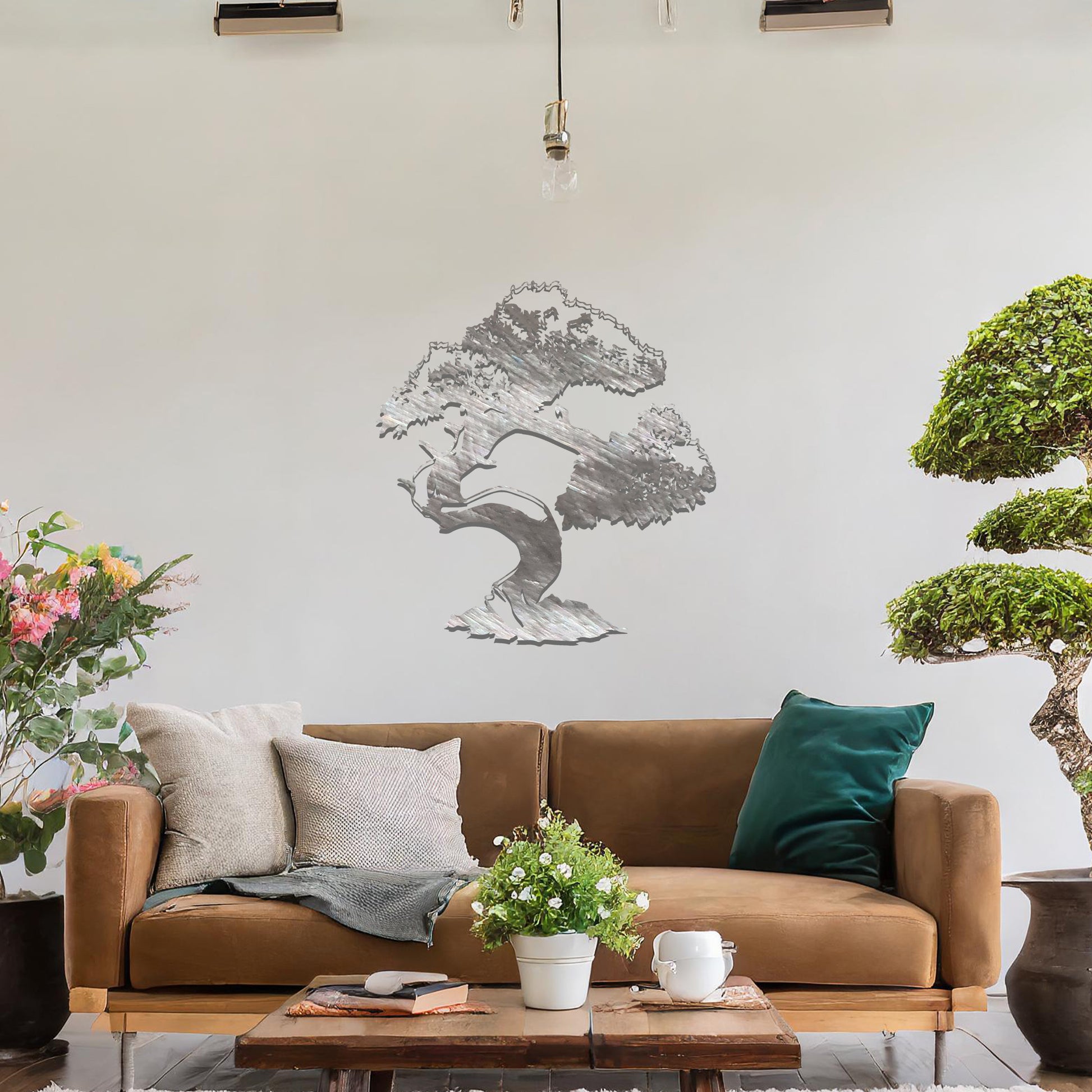 Metal wall art featuring a beautifully detailed bonsai tree design with a gracefully twisted trunk and a lush, intricate canopy, adding an elegant and nature-inspired focal point to the room's decor.