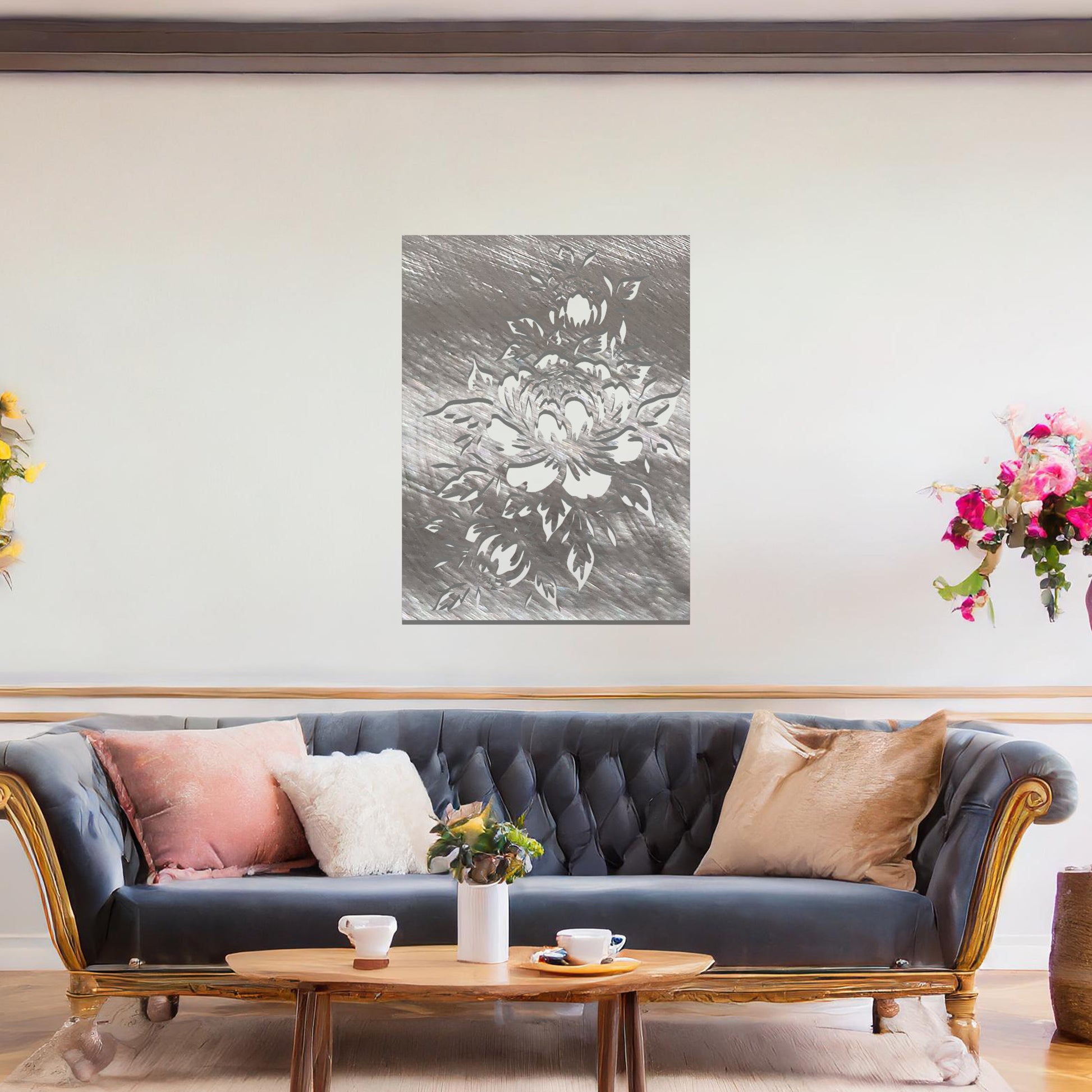 Metal wall art featuring a detailed design of a bouquet of roses, with large blossoms and intricate leaves. The design is cut-out, capturing the delicate petals and curves of the flowers. The artwork is displayed against a neutral wall within a modern interior.