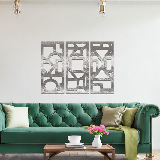 Metal wall art set of three panels with geometric patterns featuring a series of rectangles, squares, and circles arranged in an abstract design. The art is placed on a neutral wall in a modern room with minimalist decor, adding an elegant, artistic touch to the space.
