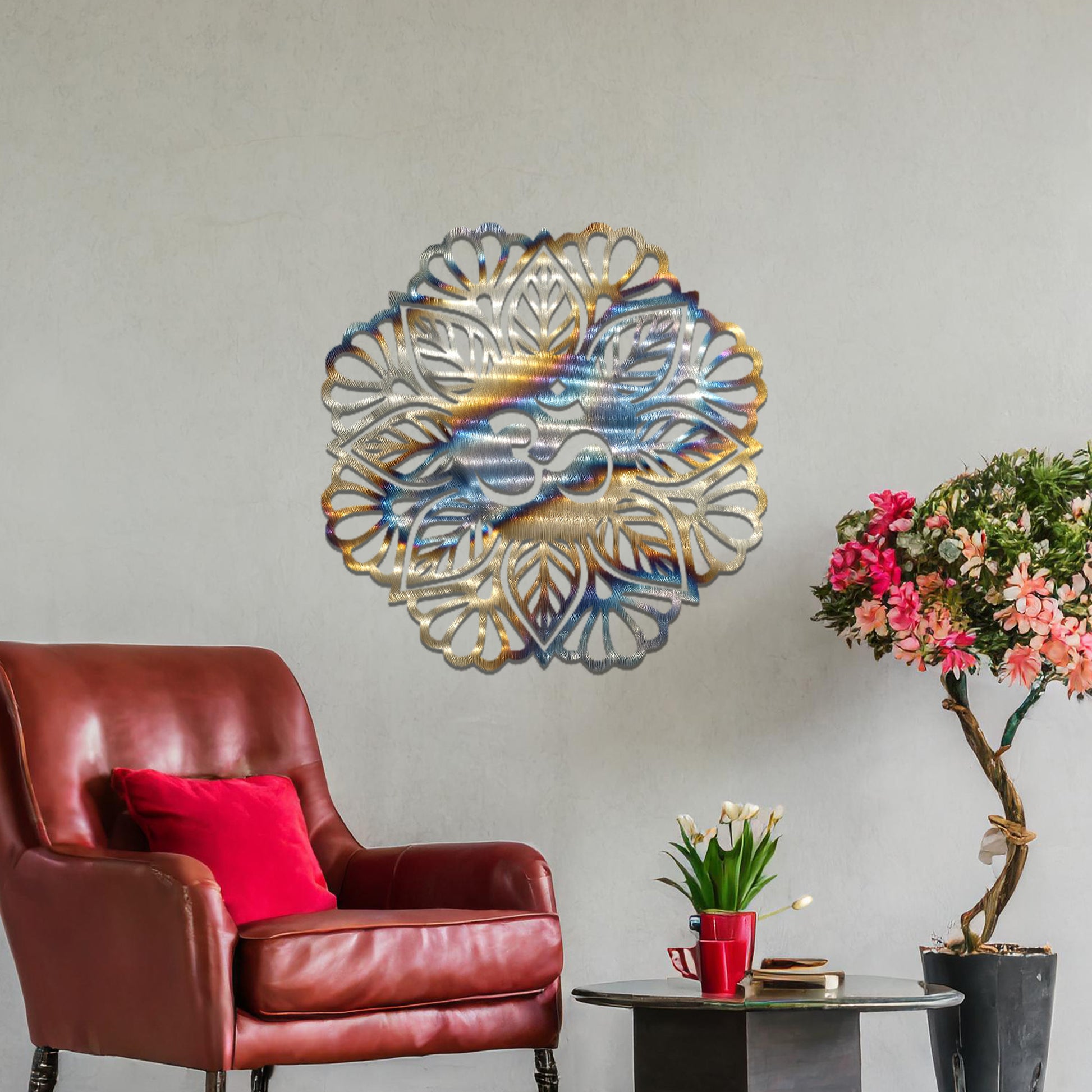 Metal wall art featuring an intricate mandala design with the Om symbol at its center, mounted on a neutral wall within modern decor. The spiritual motif and detailed craftsmanship create a calming and elegant focal point.