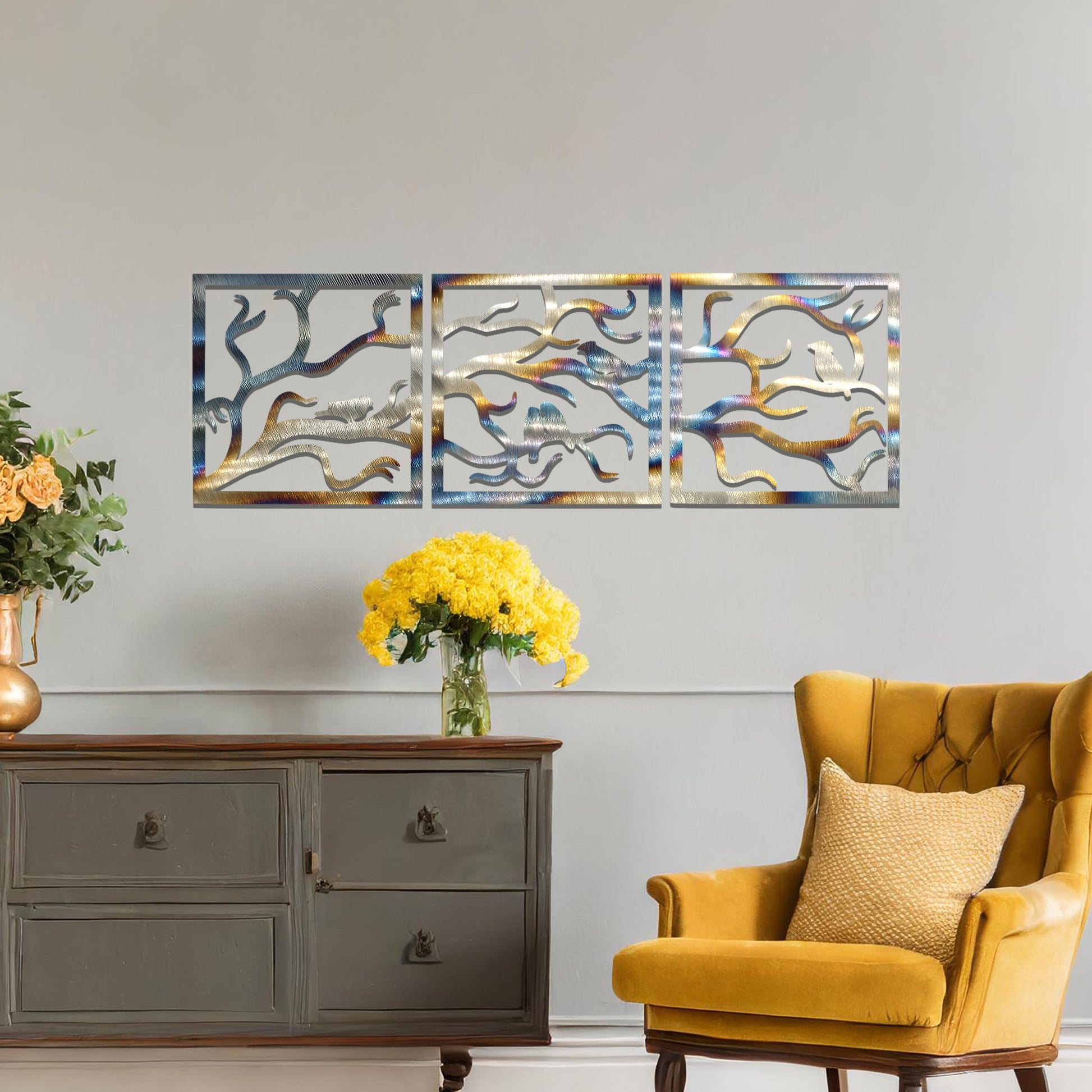 Three-panel metal wall art featuring an elegant design of birds perched on branches, creating a peaceful and nature-inspired aesthetic.