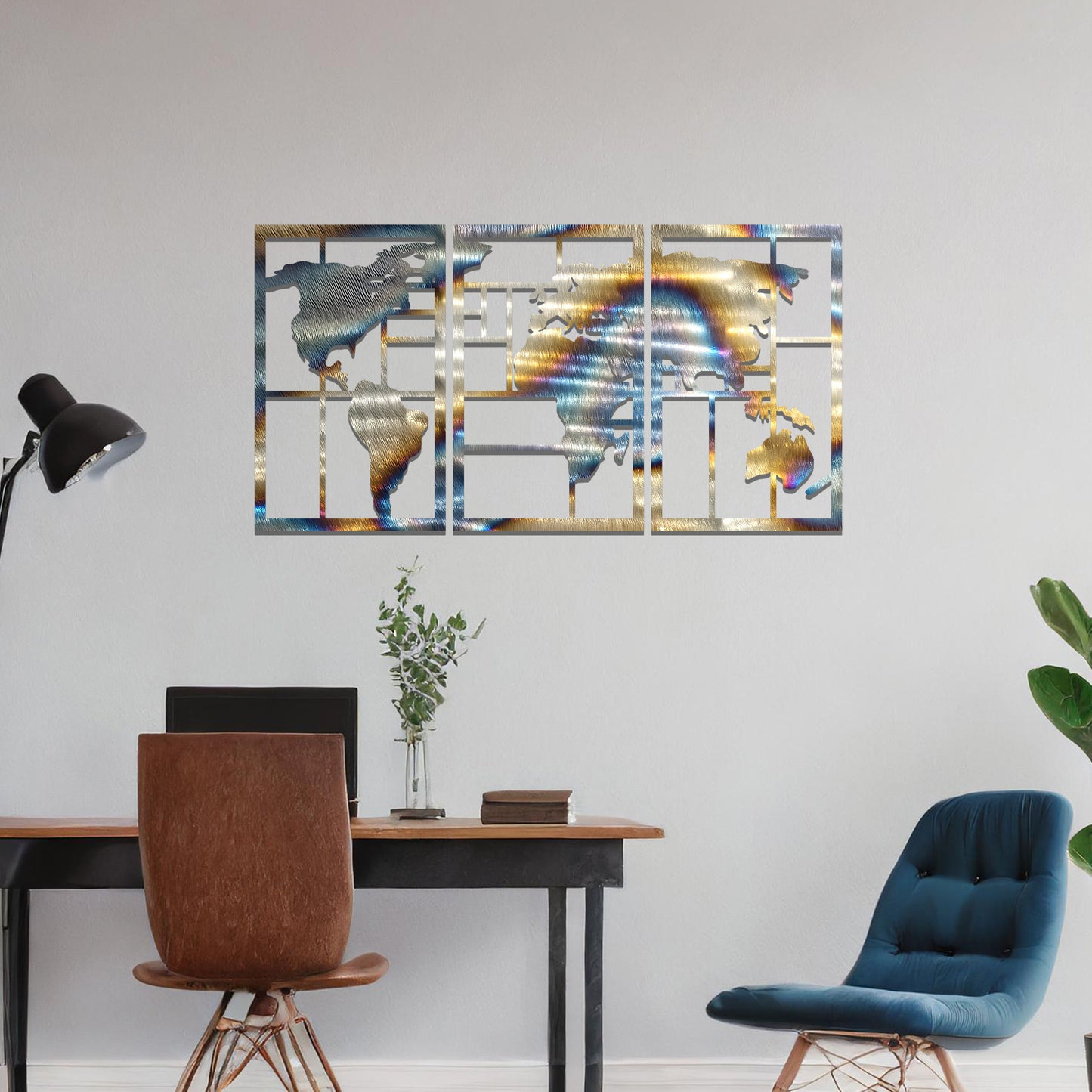 Metal wall art featuring a three-panel design of a world map with geometric patterns. The map is displayed in a contemporary layout, and the art is placed on a neutral wall within modern room decor, offering a stylish global touch to the space.