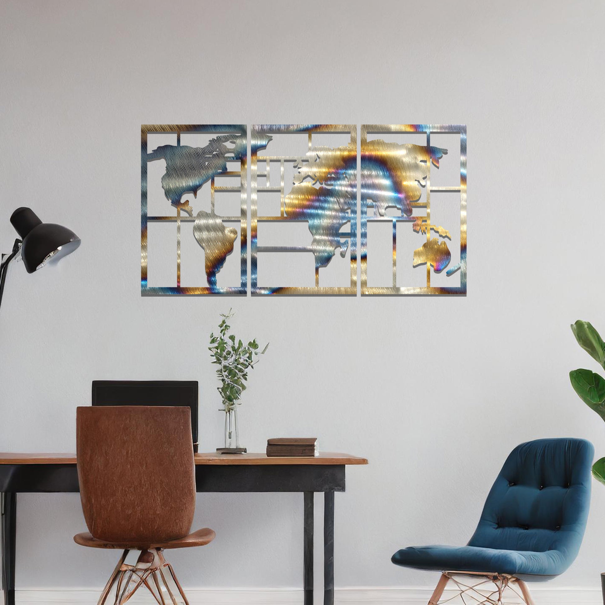 Metal wall art featuring a three-panel design of a world map with geometric patterns. The map is displayed in a contemporary layout, and the art is placed on a neutral wall within modern room decor, offering a stylish global touch to the space.