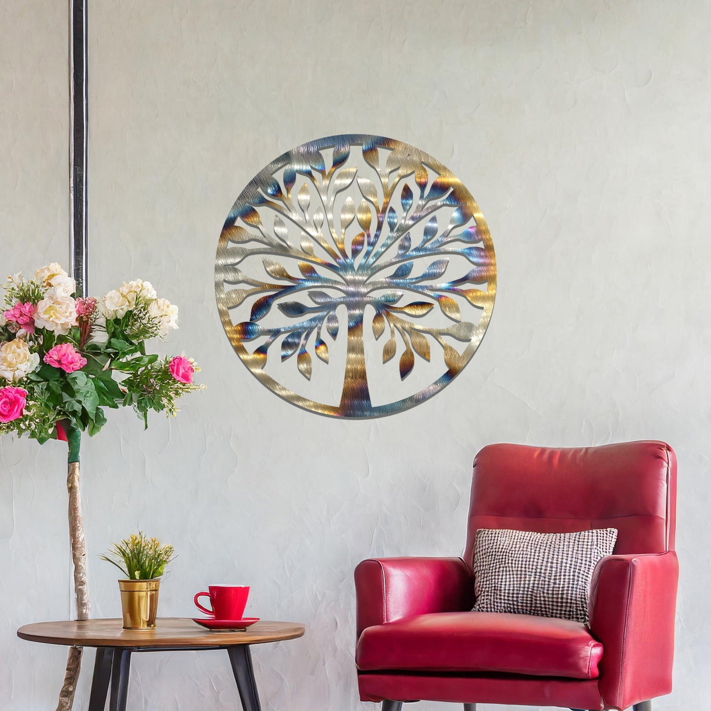 Metal wall art featuring a circular tree design with symmetrical branches and leaves, creating a balanced and nature-inspired focal point for the room.