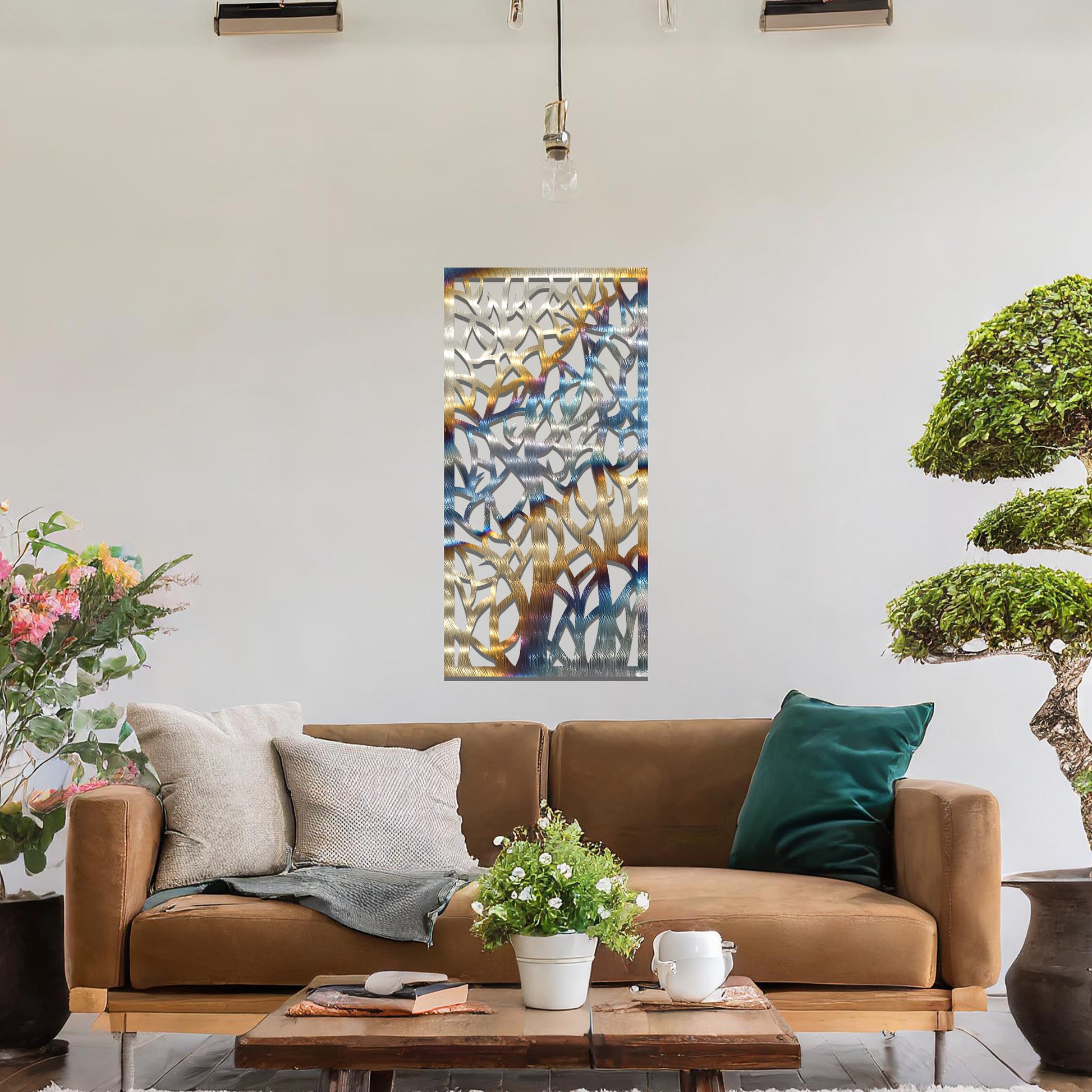 Metal wall art featuring a rectangular design with intricate tree branches and abstract shapes, creating a visually captivating and artistic focal point for the room.
