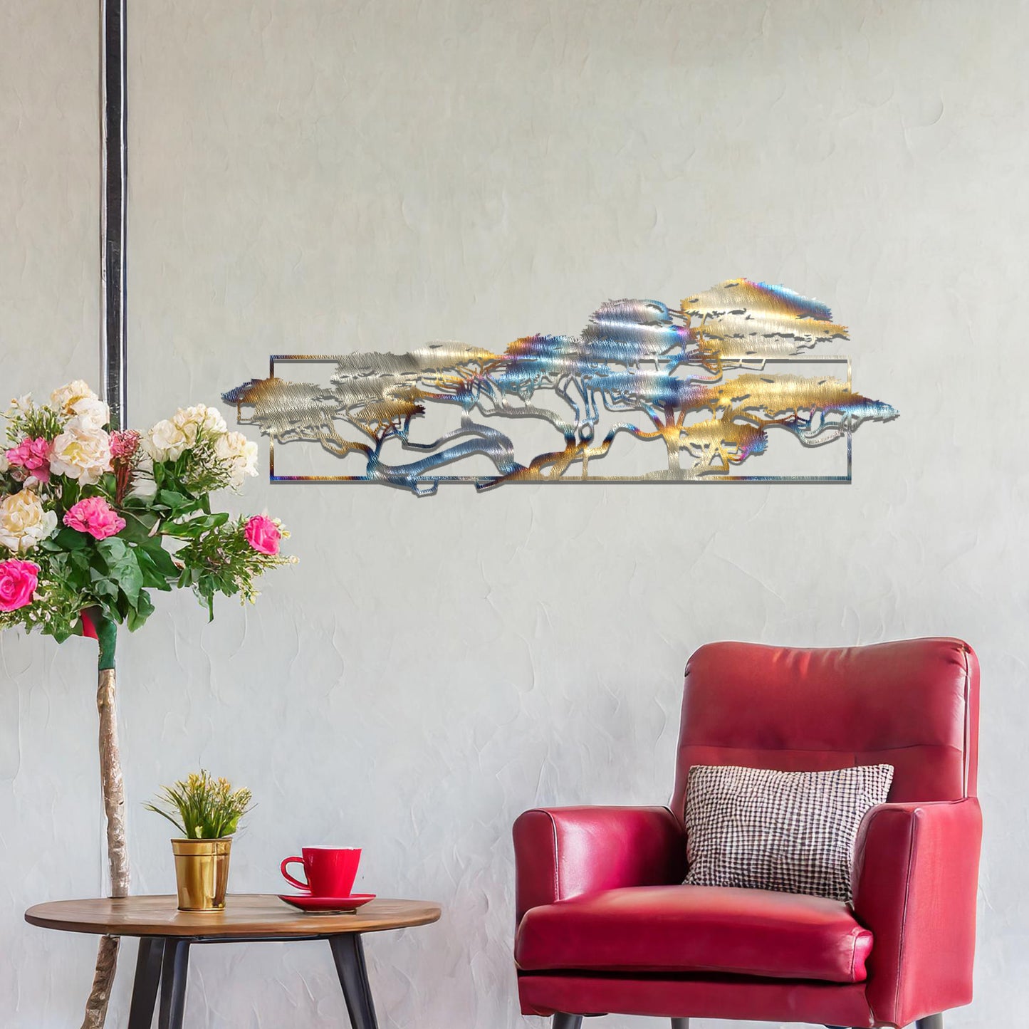 Metal wall art featuring a landscape design of a silhouette of trees with intricate branches, framed within a rectangular panel, crafted with precise laser-cut techniques, displayed on a neutral wall within modern decor.
