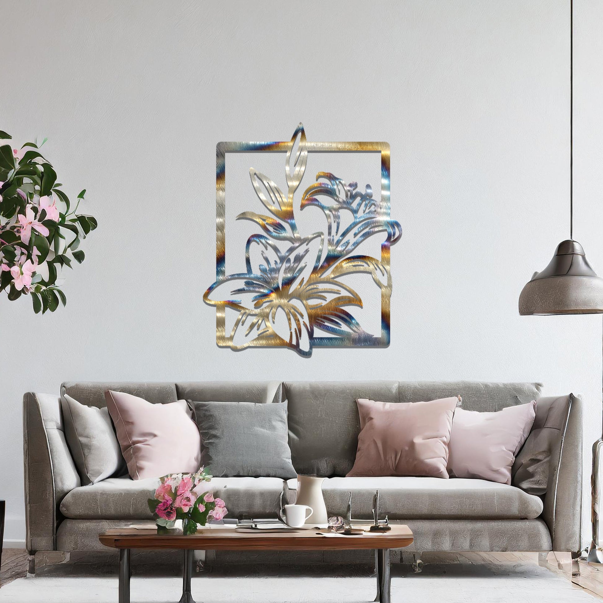 Metal wall art featuring a rectangular design with elegant floral motifs, including detailed lilies and leaves, adding a touch of sophistication and natural beauty to the space.