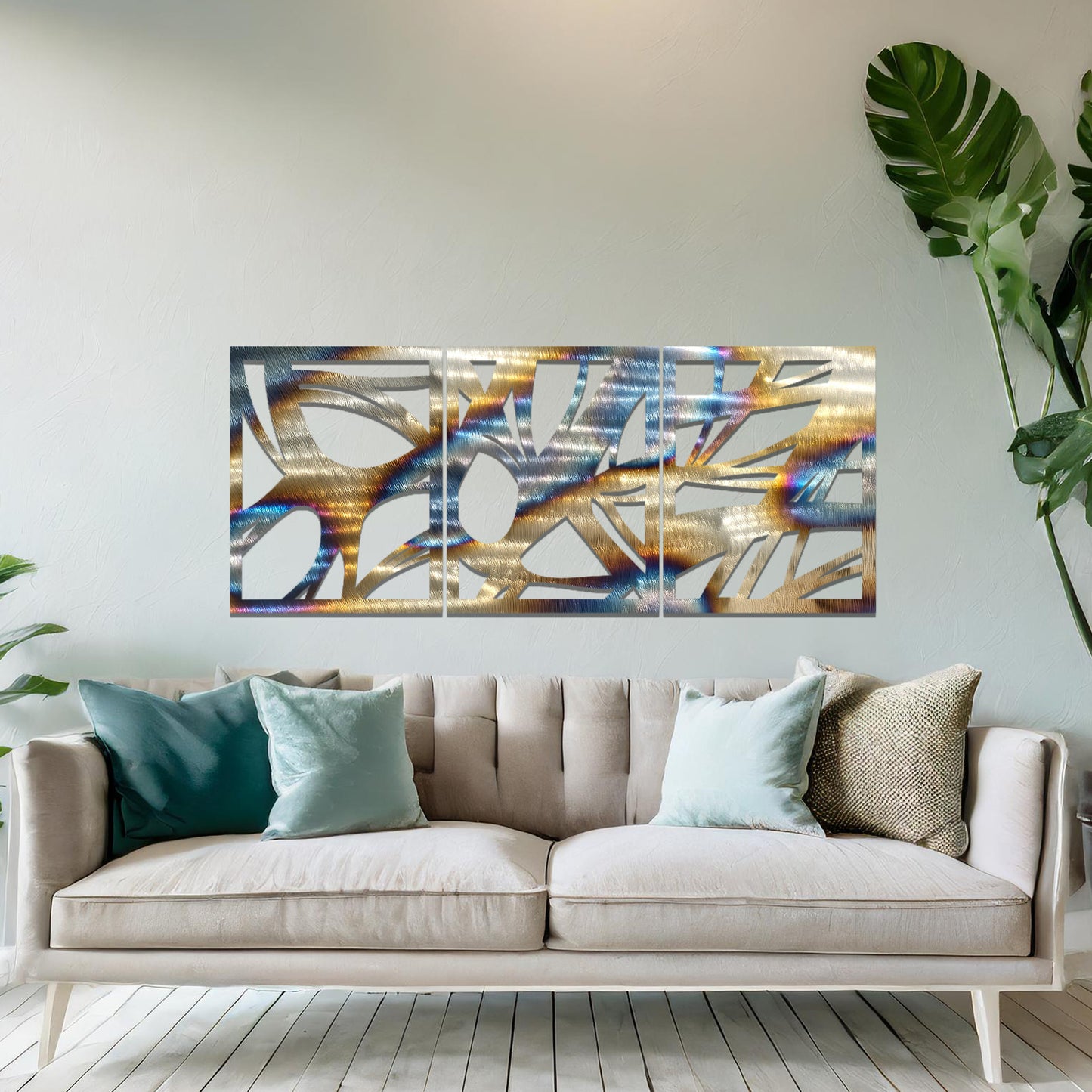 Metal wall art featuring a three-panel design with abstract organic shapes, mounted on a neutral wall within modern decor. The rust finish and fluid, nature-inspired forms create a striking focal point, enhancing the room’s natural aesthetic.