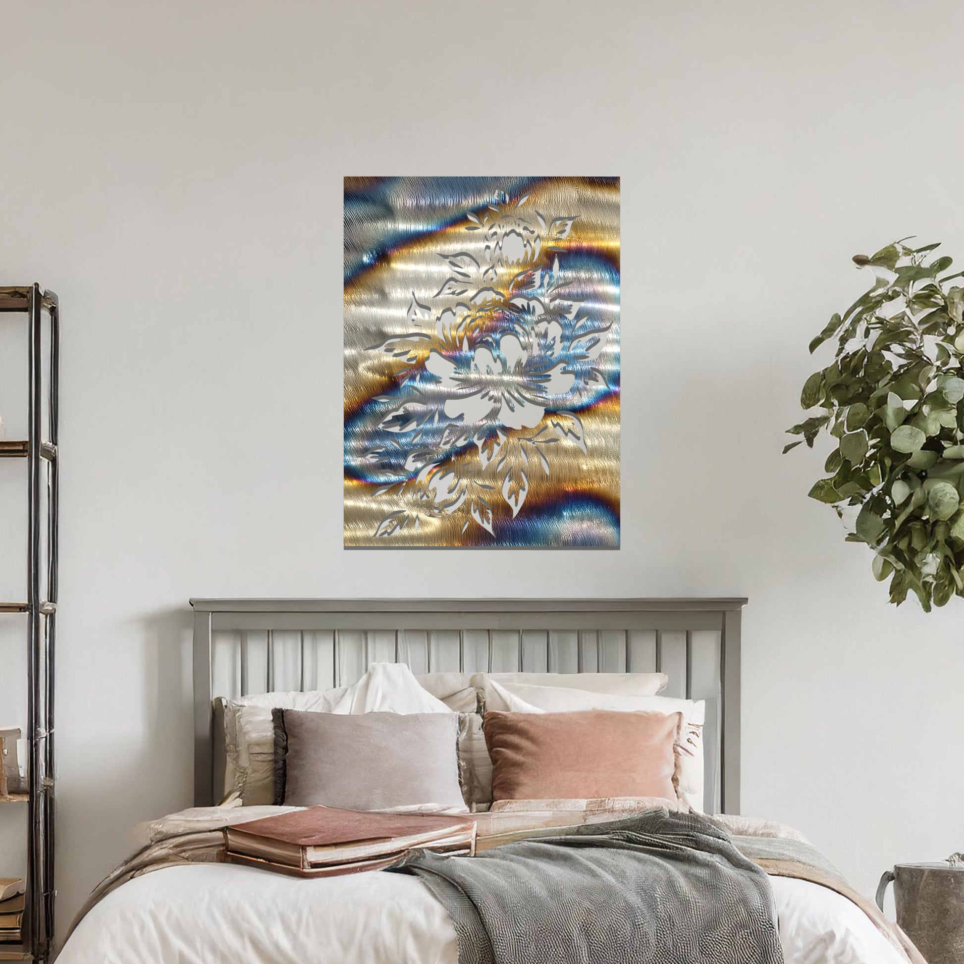 Metal wall art featuring a detailed design of a bouquet of roses, with large blossoms and intricate leaves. The design is cut-out, capturing the delicate petals and curves of the flowers. The artwork is displayed against a neutral wall within a modern interior.