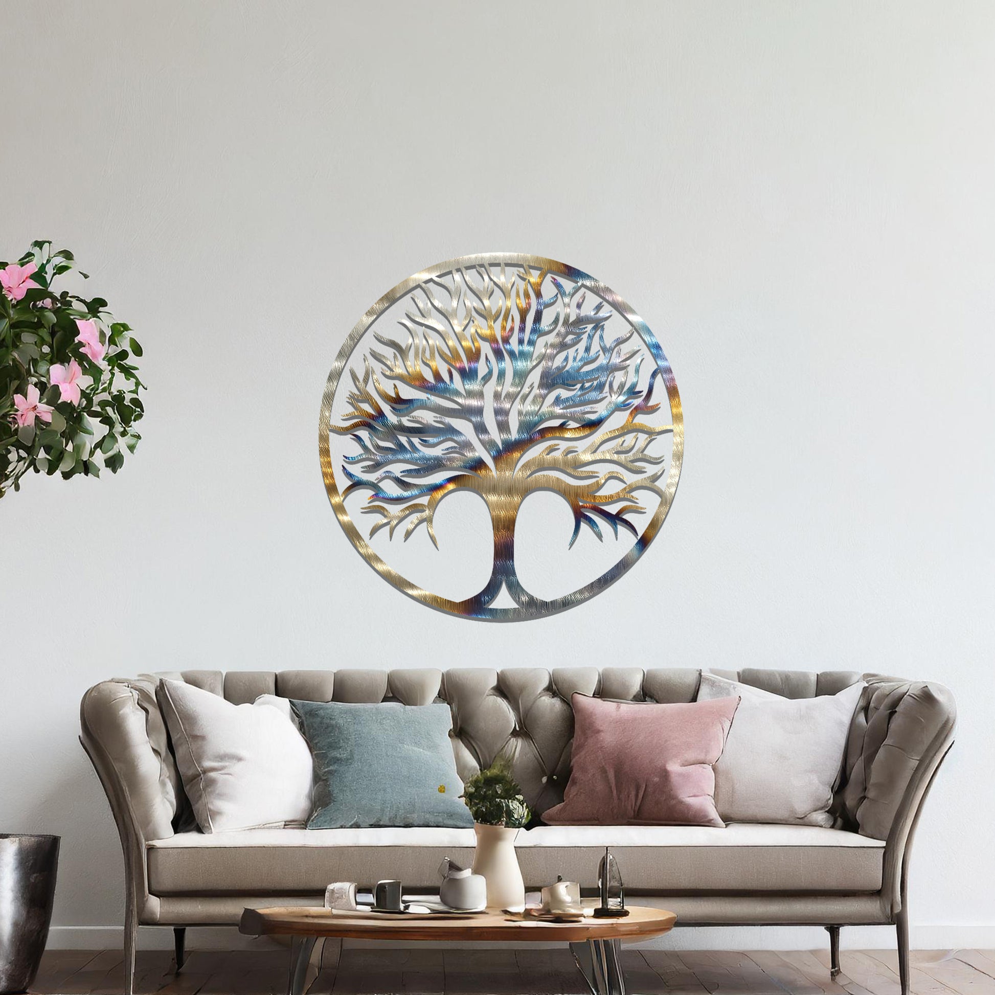Intricate metal wall art design featuring a tree with a circular frame, highlighting its branching details for a natural and elegant look in modern decor.