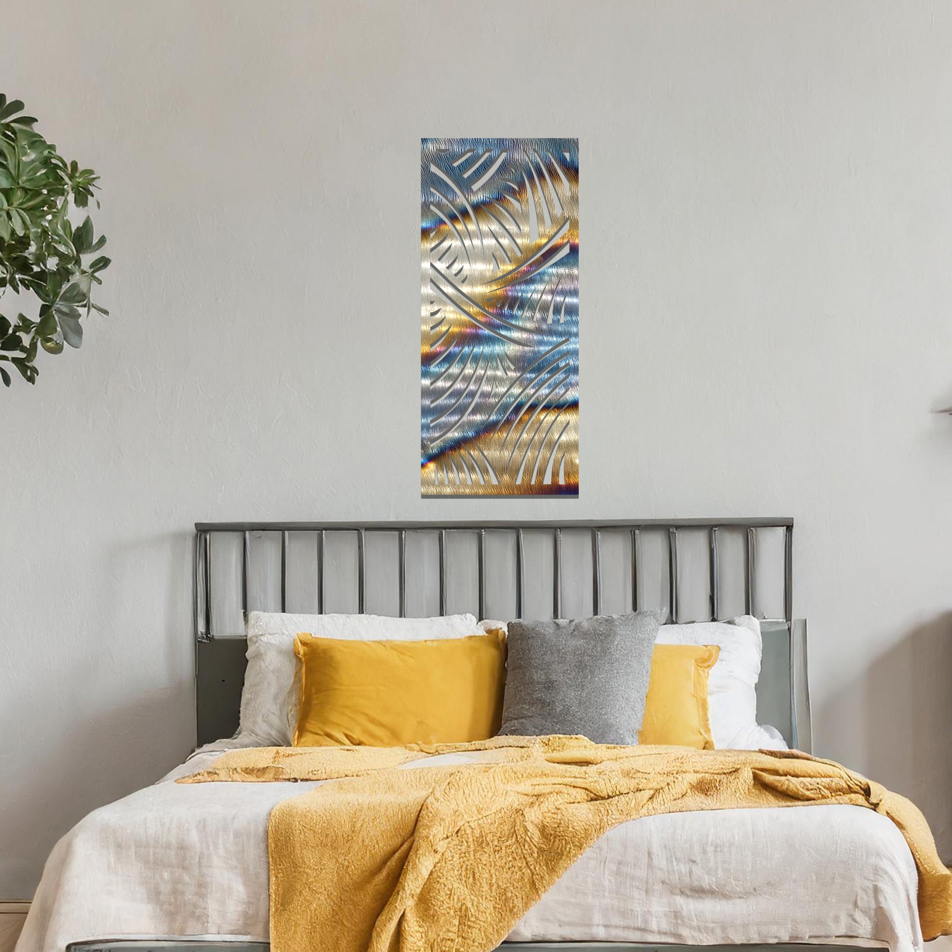 A dynamic metal wall art design featuring intricate curved lines and sweeping arcs, creating a sense of movement and depth. The artwork is displayed on a neutral wall within a modern living space, adding a sophisticated touch.