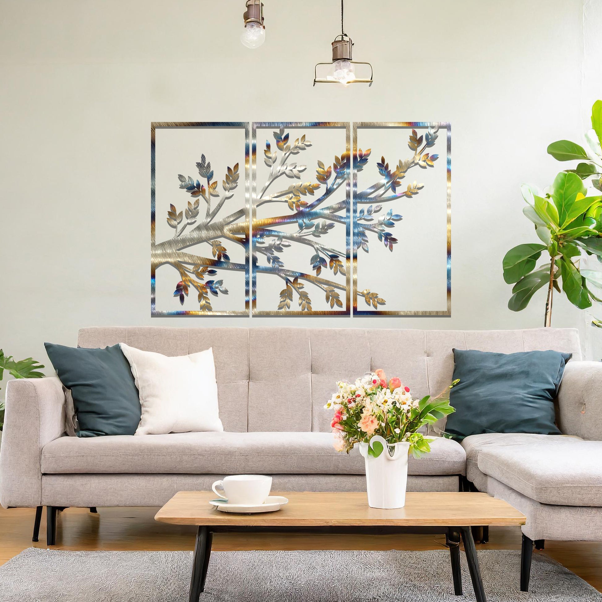 A three-panel artwork featuring an intricate branch design adorned with detailed leaves, creating a captivating and natural aesthetic. Perfect for enhancing any wall space with elegance.