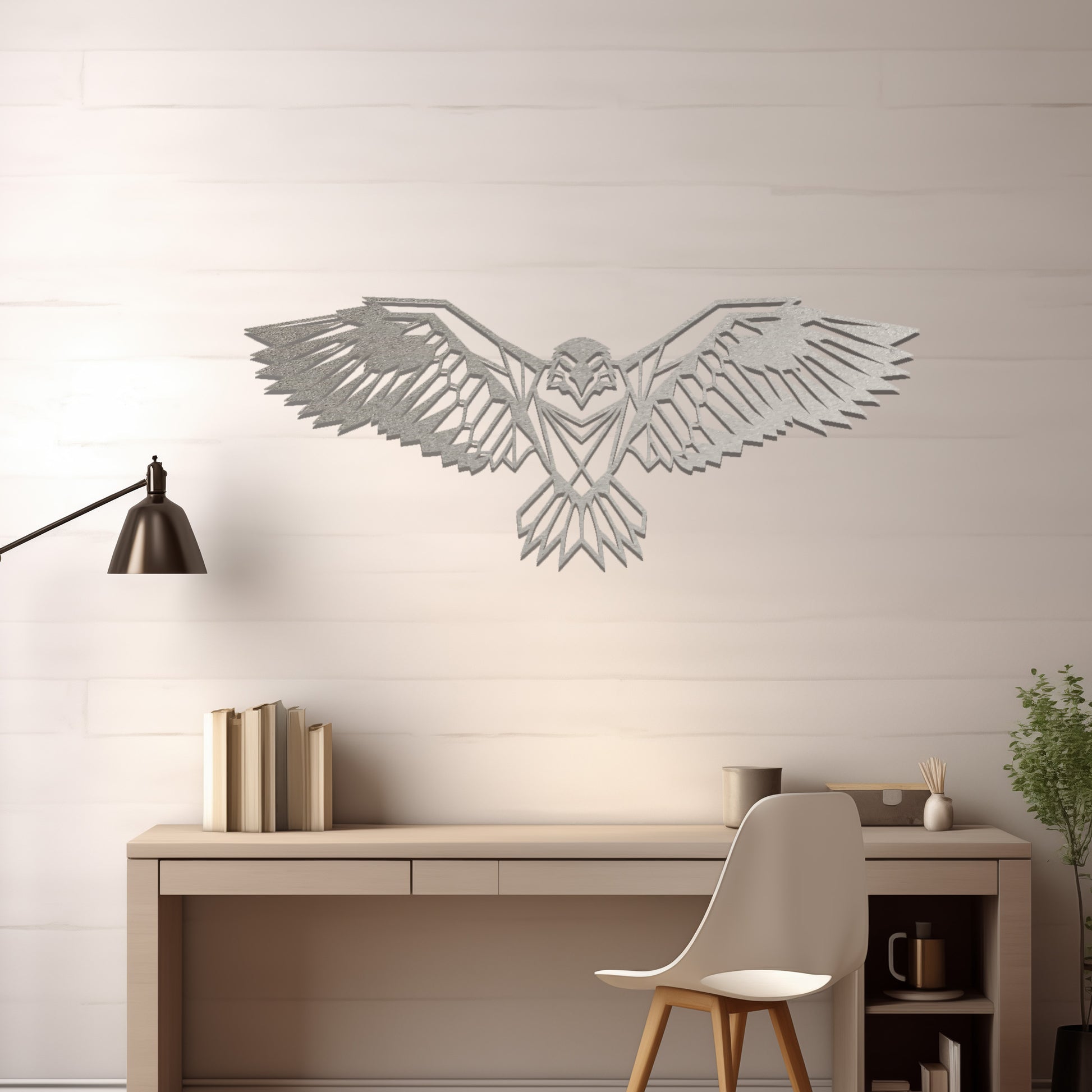 Metal wall art featuring a geometric eagle design with outstretched wings and intricate detailing, crafted with precise laser-cut techniques, displayed on a neutral wall within modern decor.