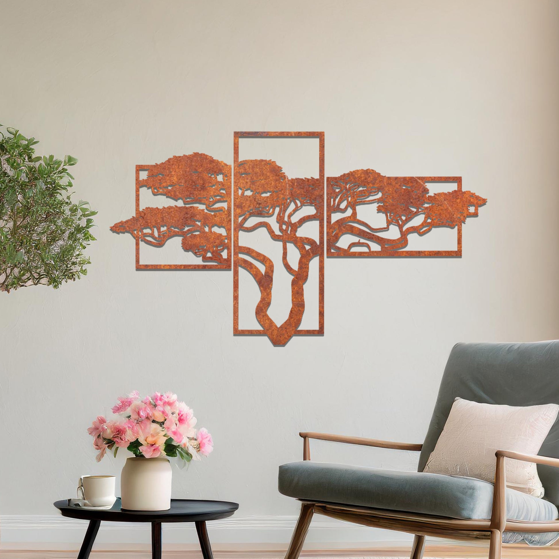 Metal wall art featuring a multi-panel tree design with a detailed branching structure, crafted with precise laser-cut techniques, displayed on a neutral wall within modern decor.