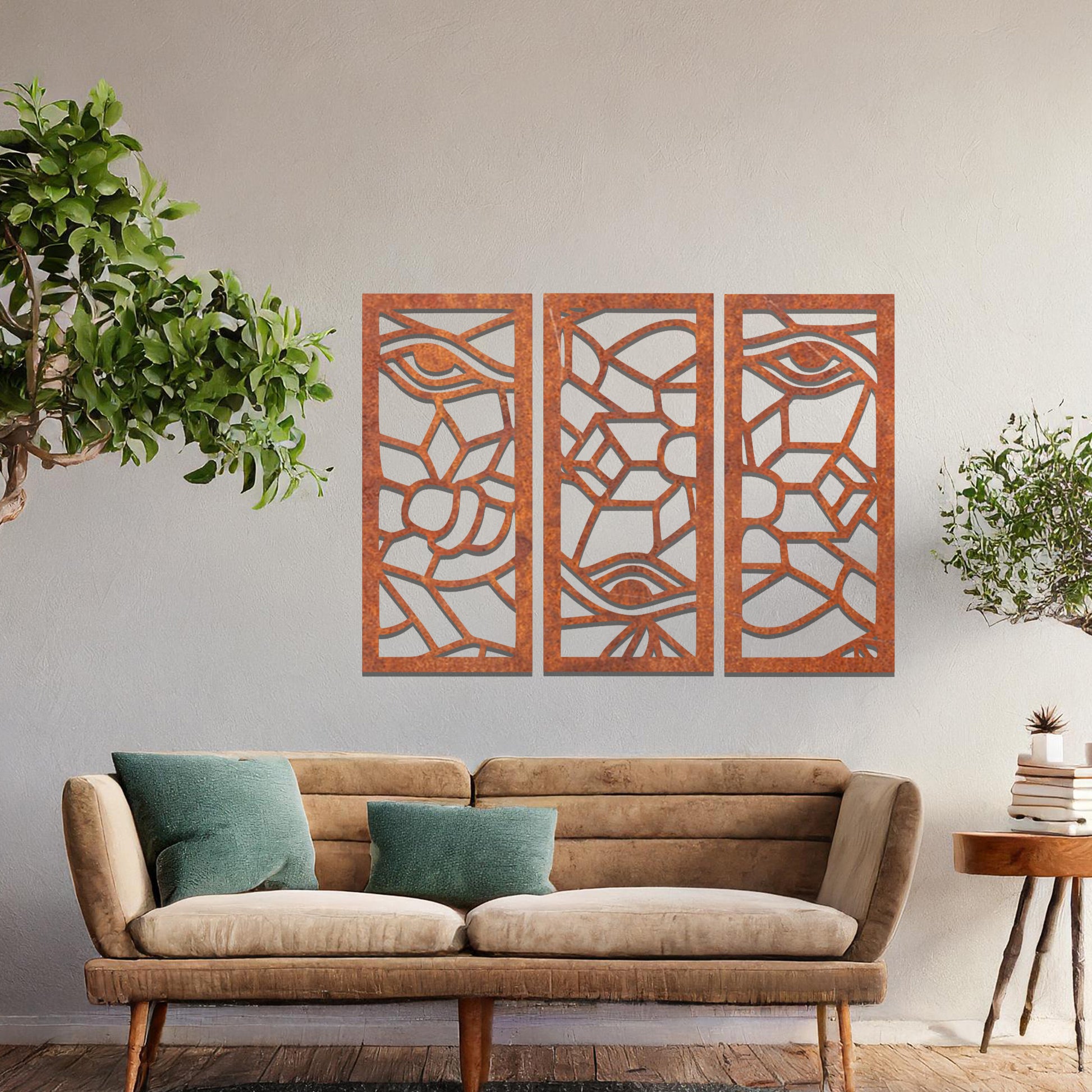 Decorative metal wall art featuring a set of three geometric panels with intricate abstract designs, mounted on a neutral wall within modern room decor. The focus is on the unique craftsmanship and harmonious composition of the wall art, enhancing the contemporary aesthetic of the space.