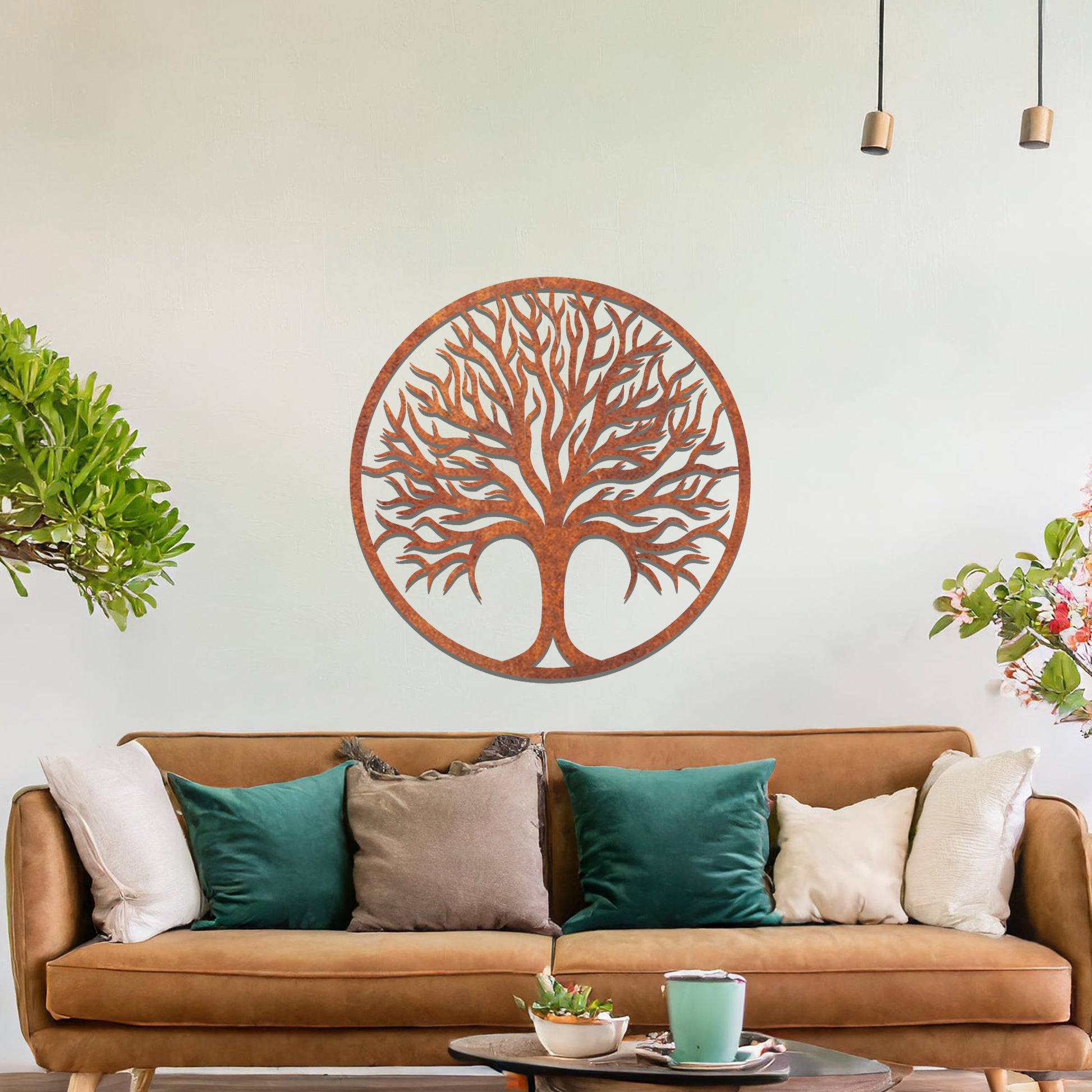 Intricate metal wall art design featuring a tree with a circular frame, highlighting its branching details for a natural and elegant look in modern decor.
