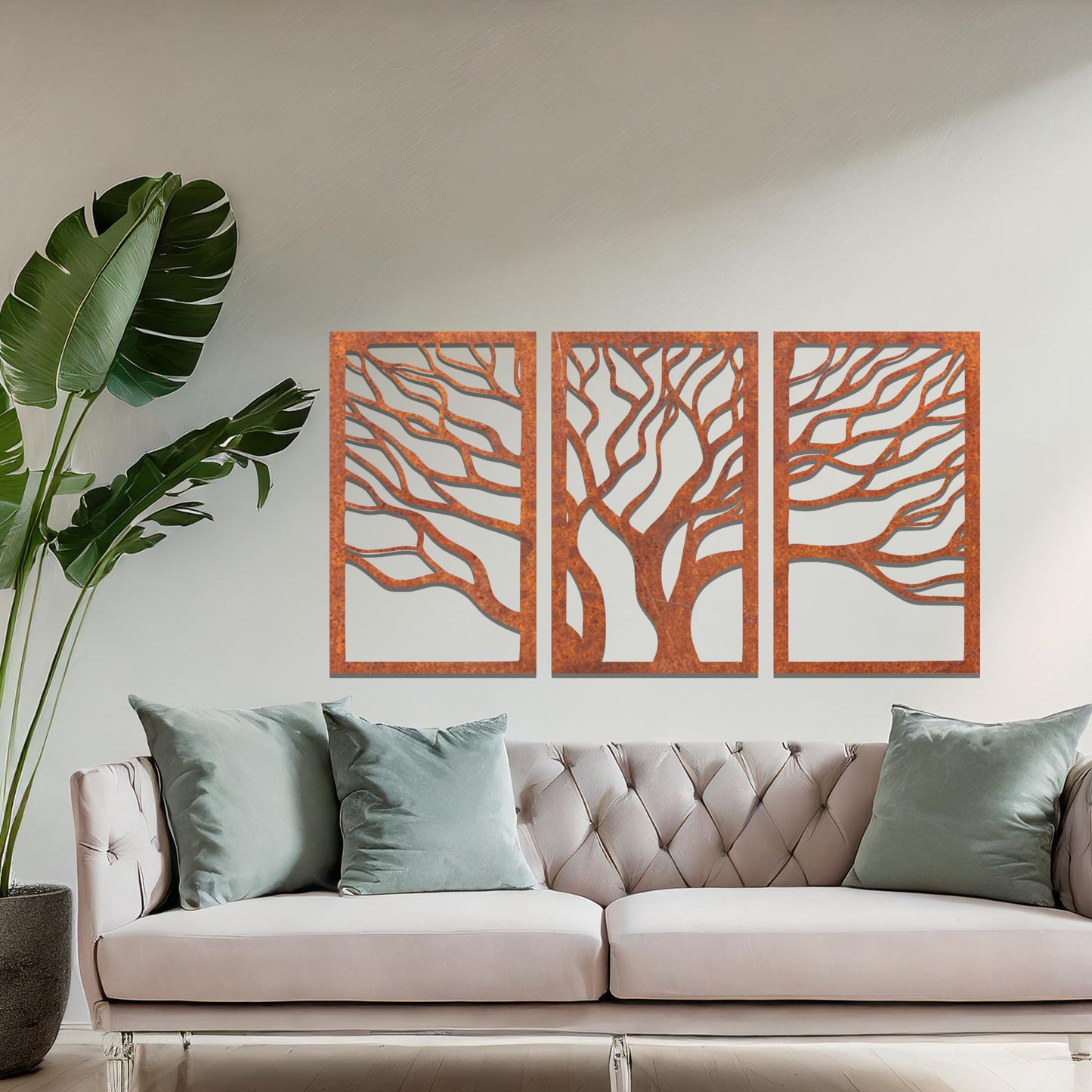 Three-panel metal wall art featuring intricately cut tree branches in a flowing design, creating a dynamic and organic effect.