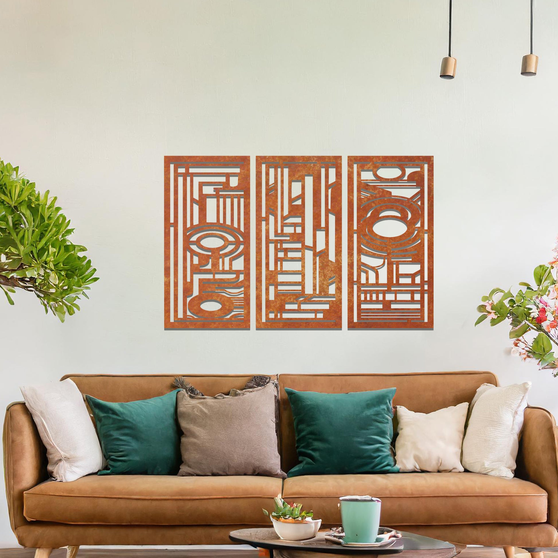 Modern geometric wall art consisting of three panels, each featuring intricate designs with circular and rectangular elements. The artwork is displayed in a contemporary living room with neutral-toned furniture and plants.