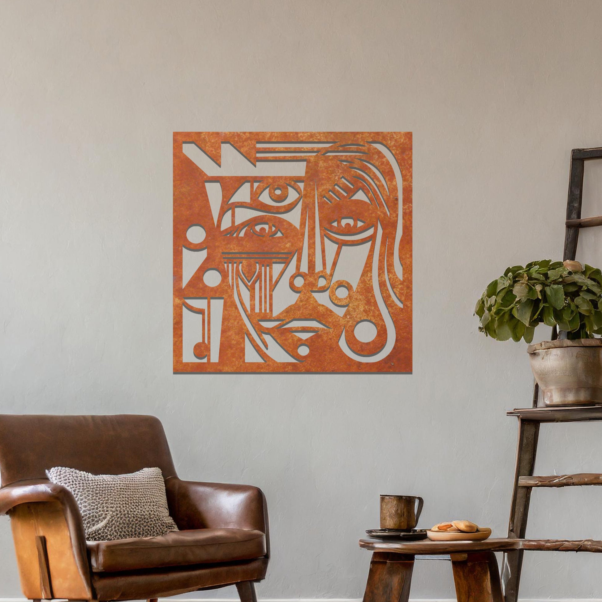 Abstract geometric face design with bold lines, circles, and angles, creating a striking, stylized portrait. The art is displayed on a neutral wall in a modern room setting with minimalistic decor.