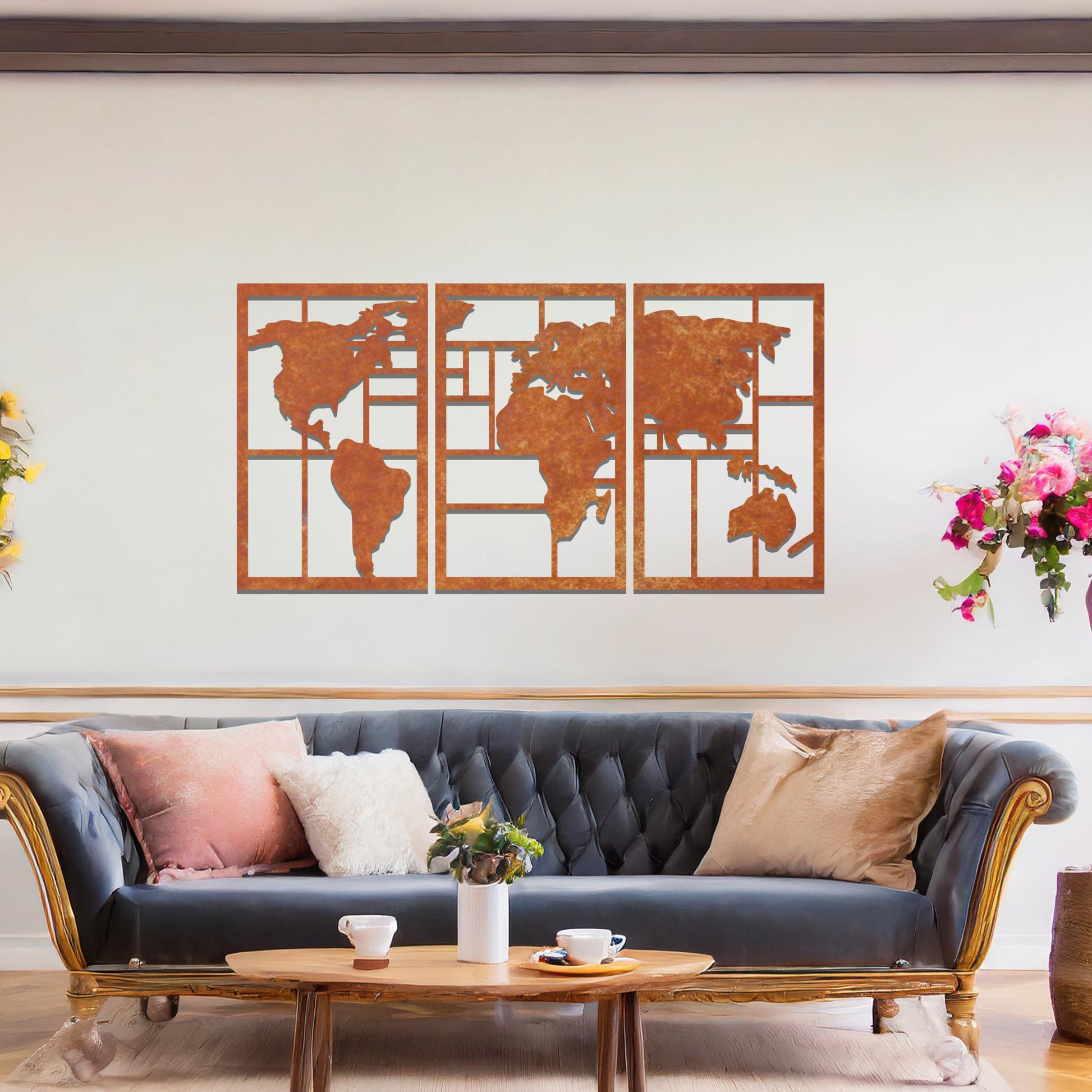 Metal wall art featuring a three-panel design of a world map with geometric patterns. The map is displayed in a contemporary layout, and the art is placed on a neutral wall within modern room decor, offering a stylish global touch to the space.