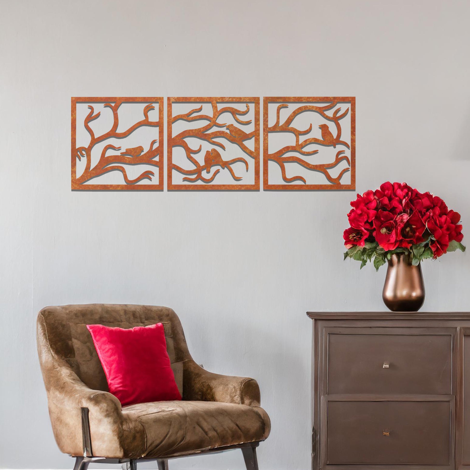 Three-panel metal wall art featuring an elegant design of birds perched on branches, creating a peaceful and nature-inspired aesthetic.
