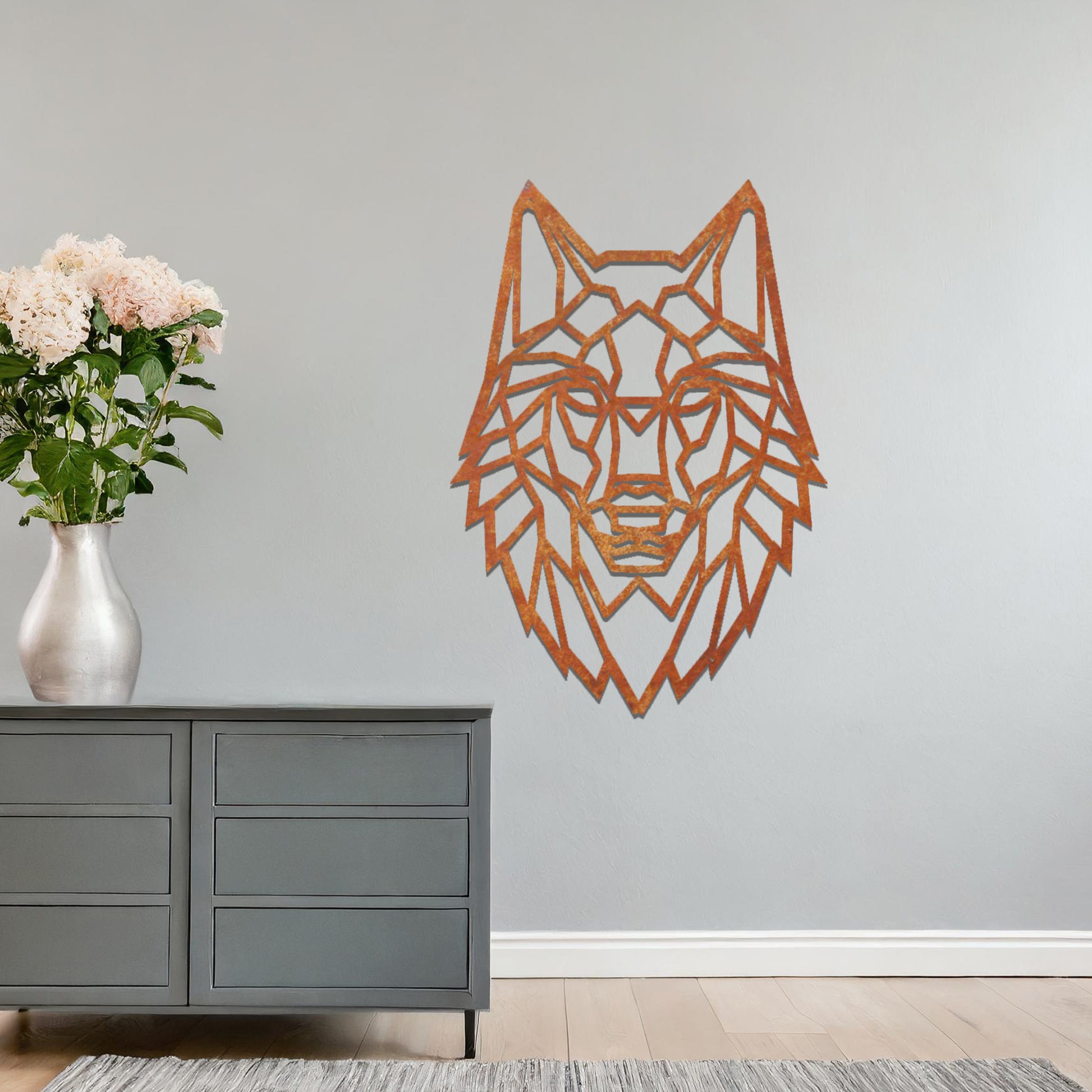 A geometric wolf head wall art design, blending modernity with the untamed spirit of nature. Its intricate lines form a striking focal point for any contemporary living space.