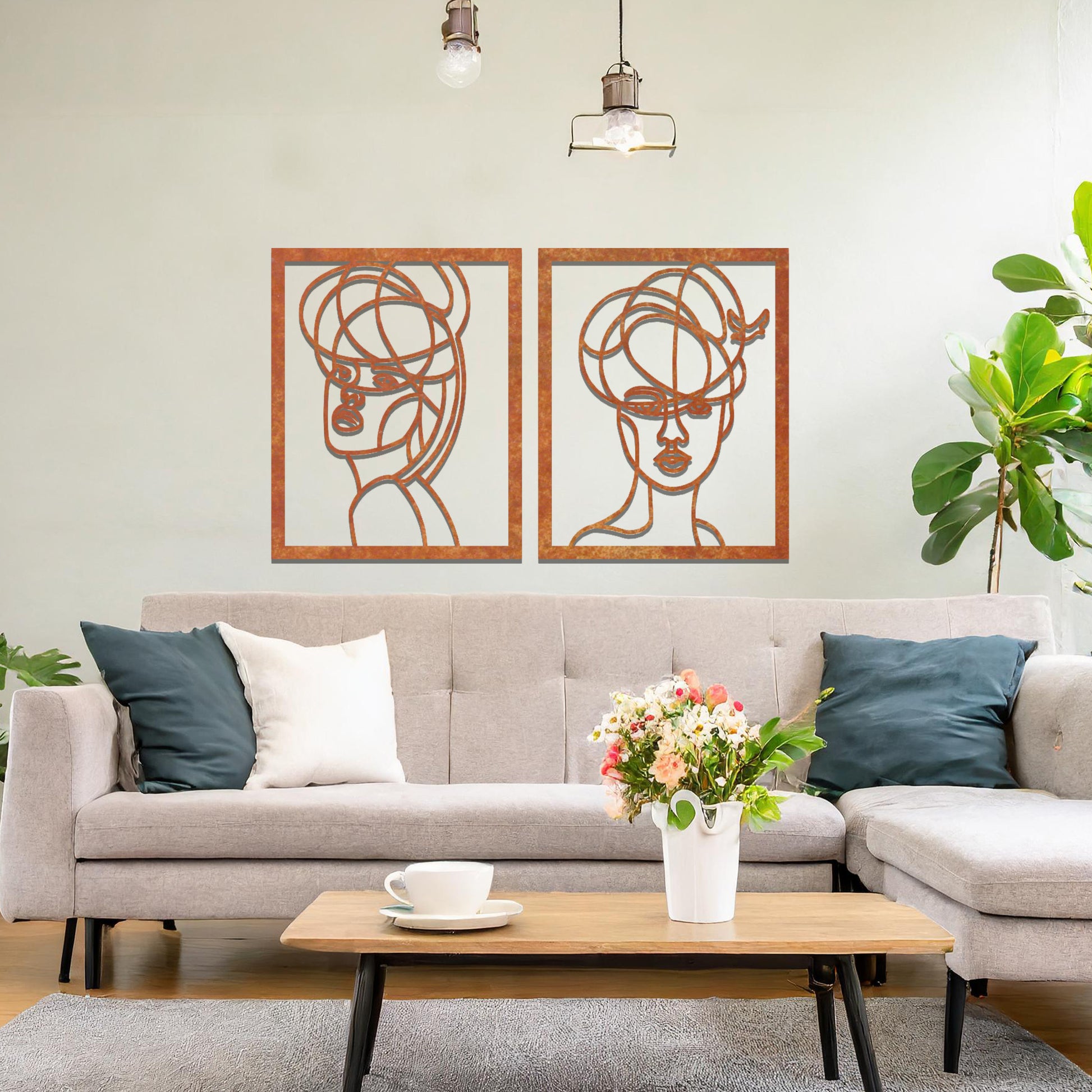 Rustic wall art featuring two abstract portraits of women with intricate line details, offering a sophisticated and modern touch to the living space.