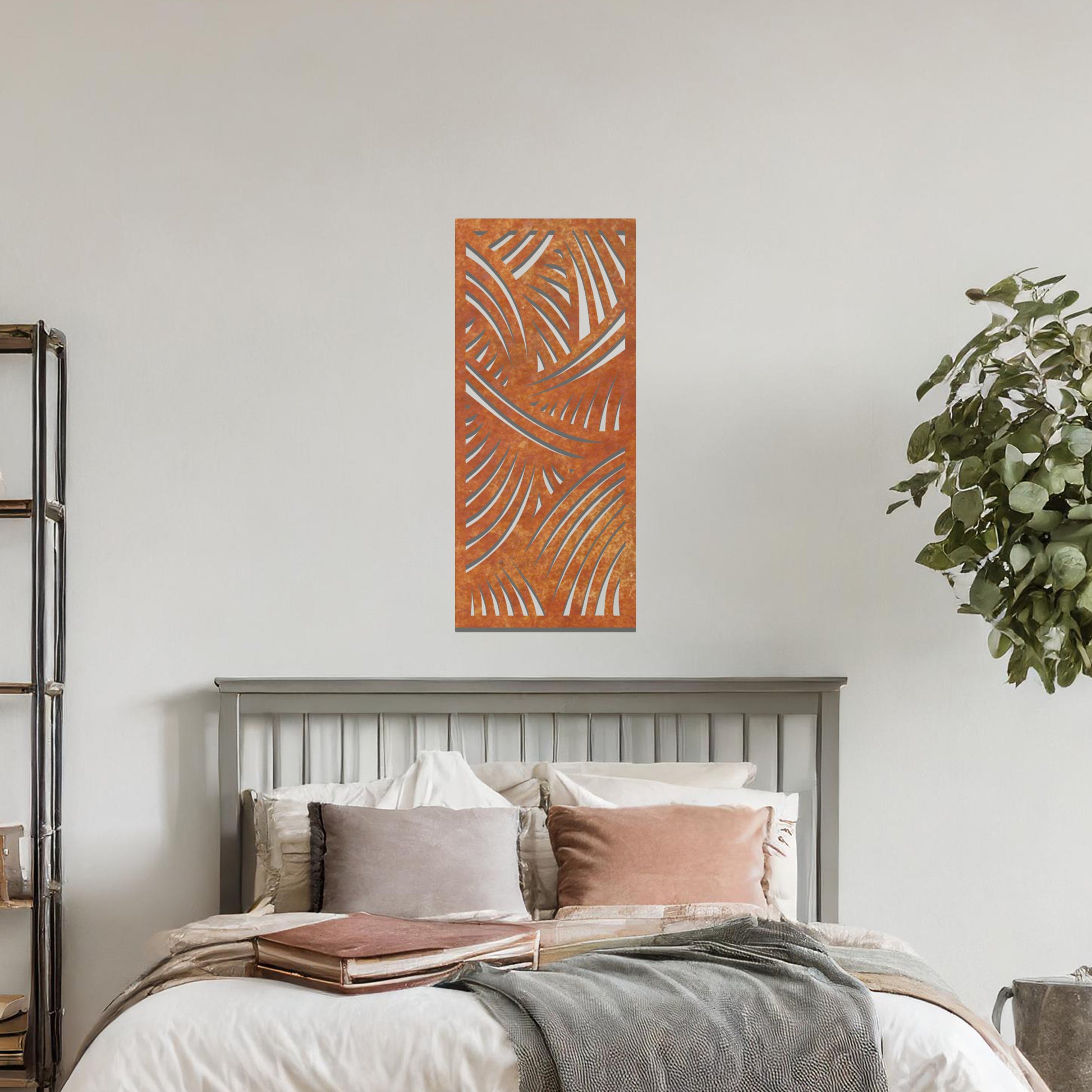 A dynamic metal wall art design featuring intricate curved lines and sweeping arcs, creating a sense of movement and depth. The artwork is displayed on a neutral wall within a modern living space, adding a sophisticated touch.