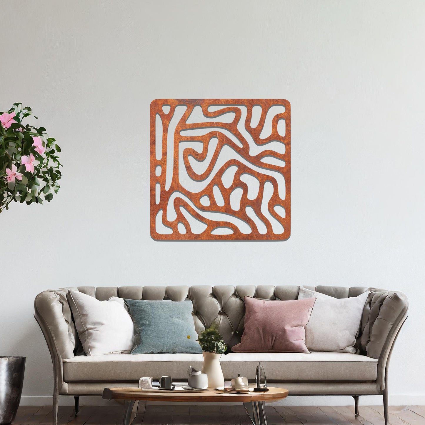 Abstract flowing line design with curved and irregular patterns, creating a dynamic and modern composition. The art is displayed on a neutral wall in a minimalist room with contemporary decor.