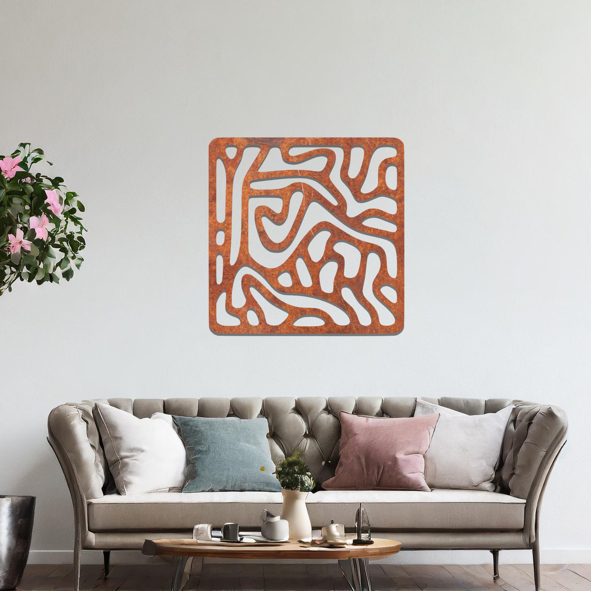 Abstract flowing line design with curved and irregular patterns, creating a dynamic and modern composition. The art is displayed on a neutral wall in a minimalist room with contemporary decor.