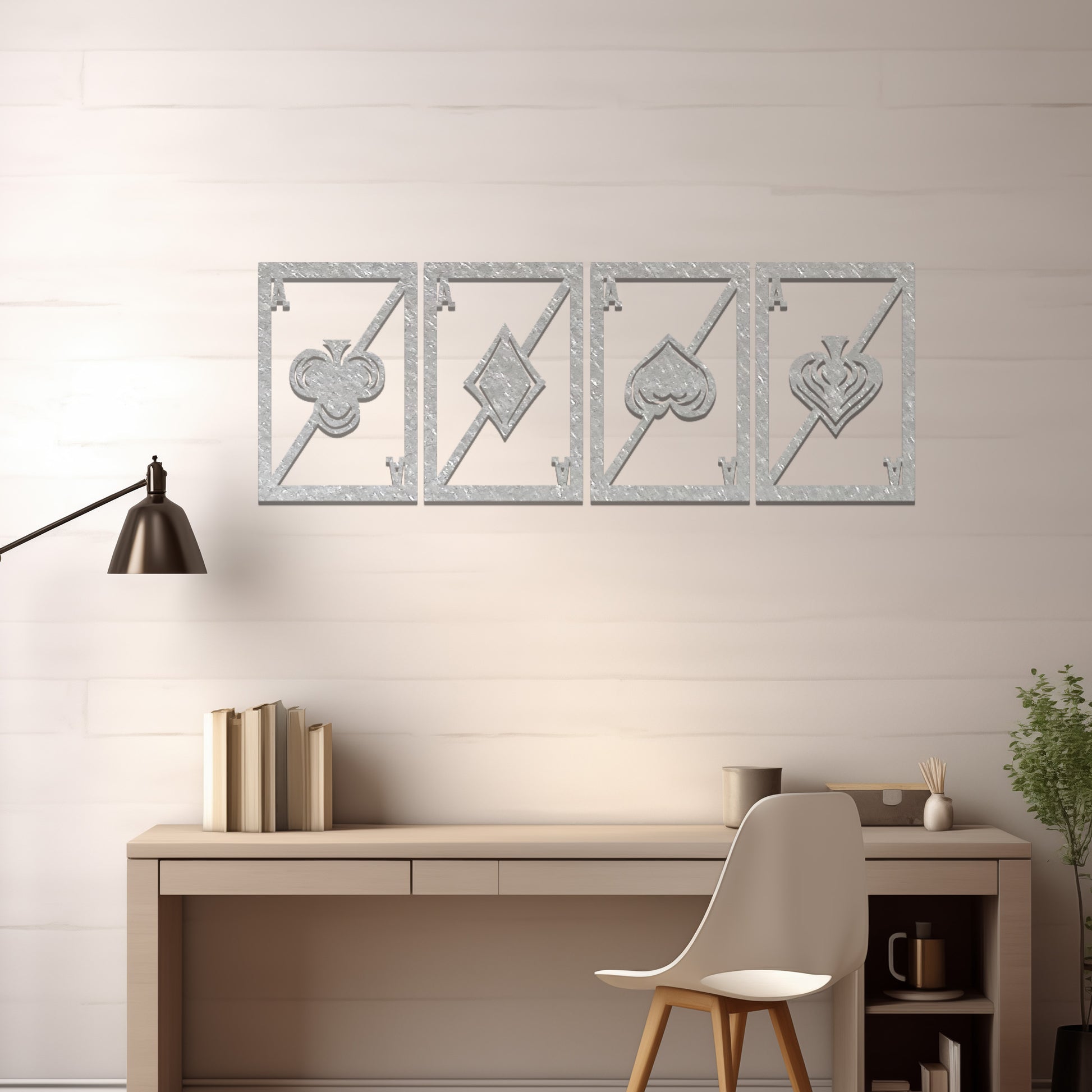 Metal wall art featuring a four-panel design inspired by playing card suits—clubs, diamonds, hearts, and spades—each framed with a modern aesthetic, creating a bold statement piece in the interior setting.