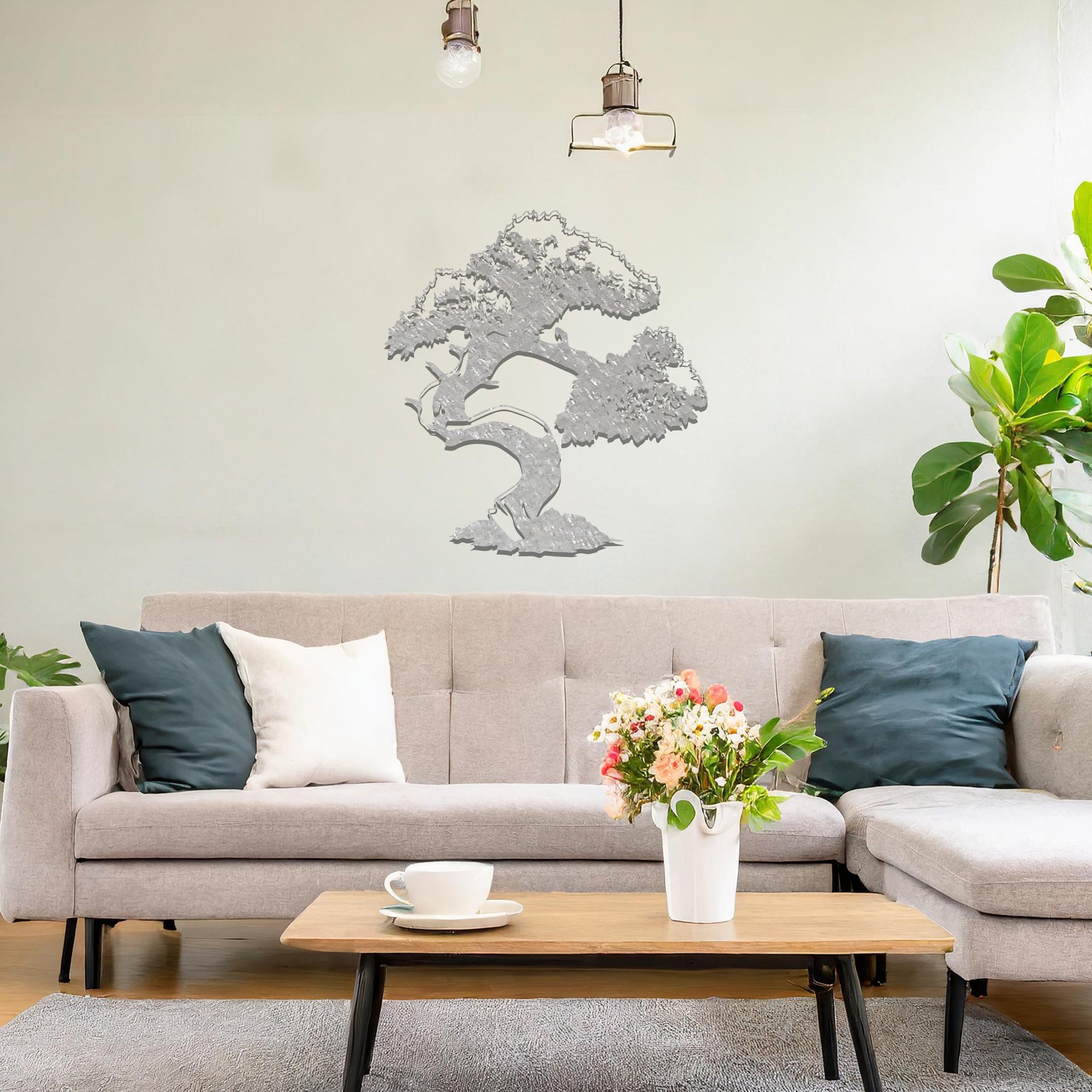 Metal wall art featuring a beautifully detailed bonsai tree design with a gracefully twisted trunk and a lush, intricate canopy, adding an elegant and nature-inspired focal point to the room's decor.