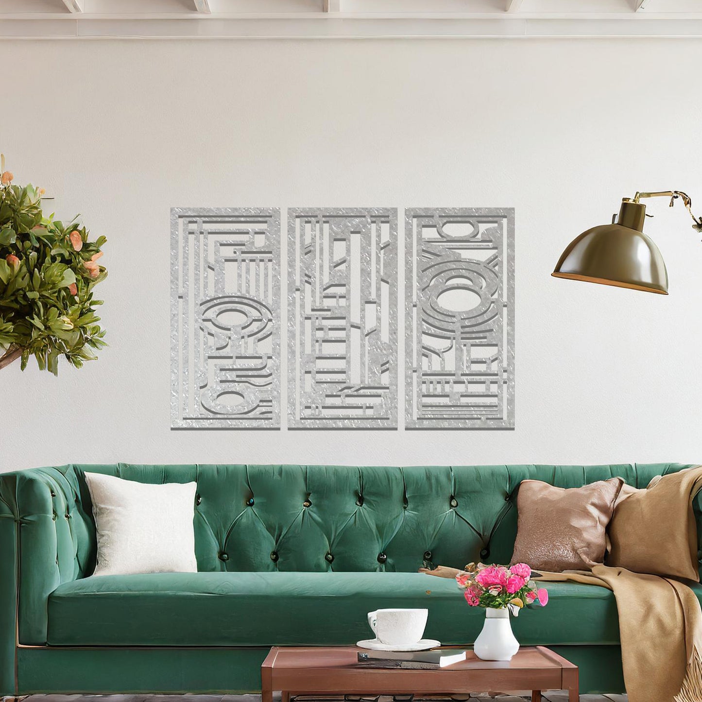 Modern geometric wall art consisting of three panels, each featuring intricate designs with circular and rectangular elements. The artwork is displayed in a contemporary living room with neutral-toned furniture and plants.